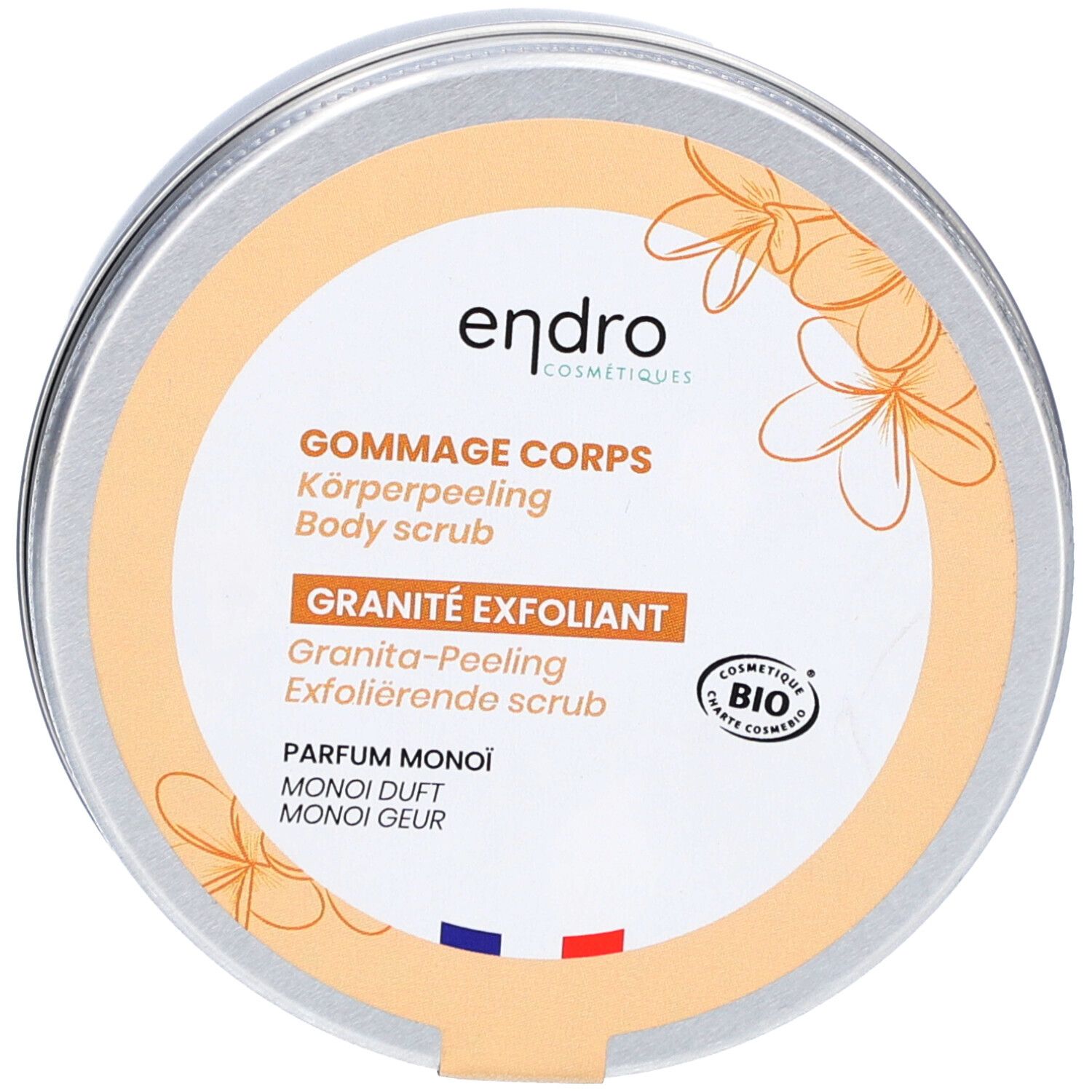Runder Tiegel mit Deckel. Aufschrift: Gommage Corps, Granité Exfoliant, Parfum Monoï. Bio-Zertifizierung. Endro-Logo.