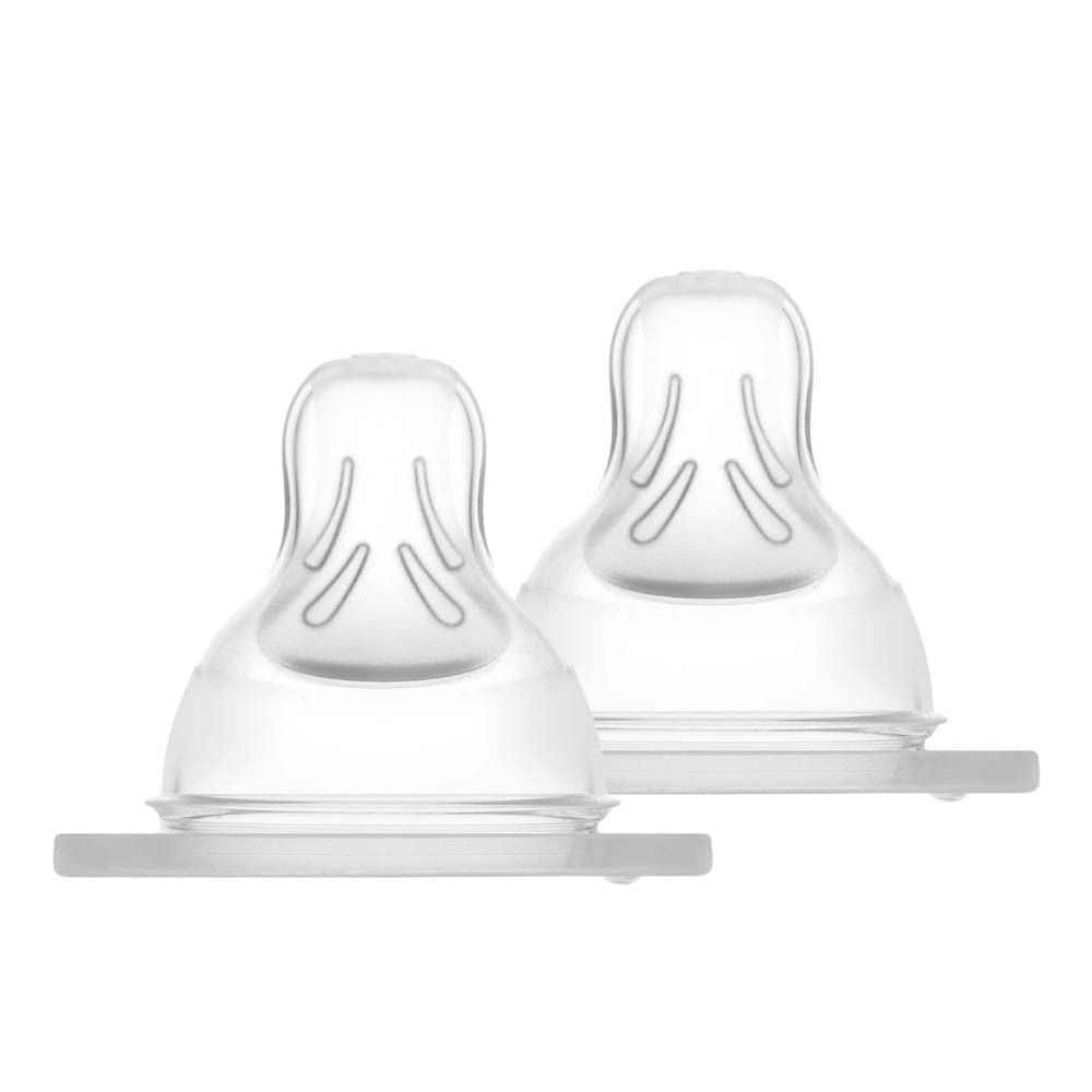 Deux tétines Mam 1 en silicone transparent, texture Skin Soft.