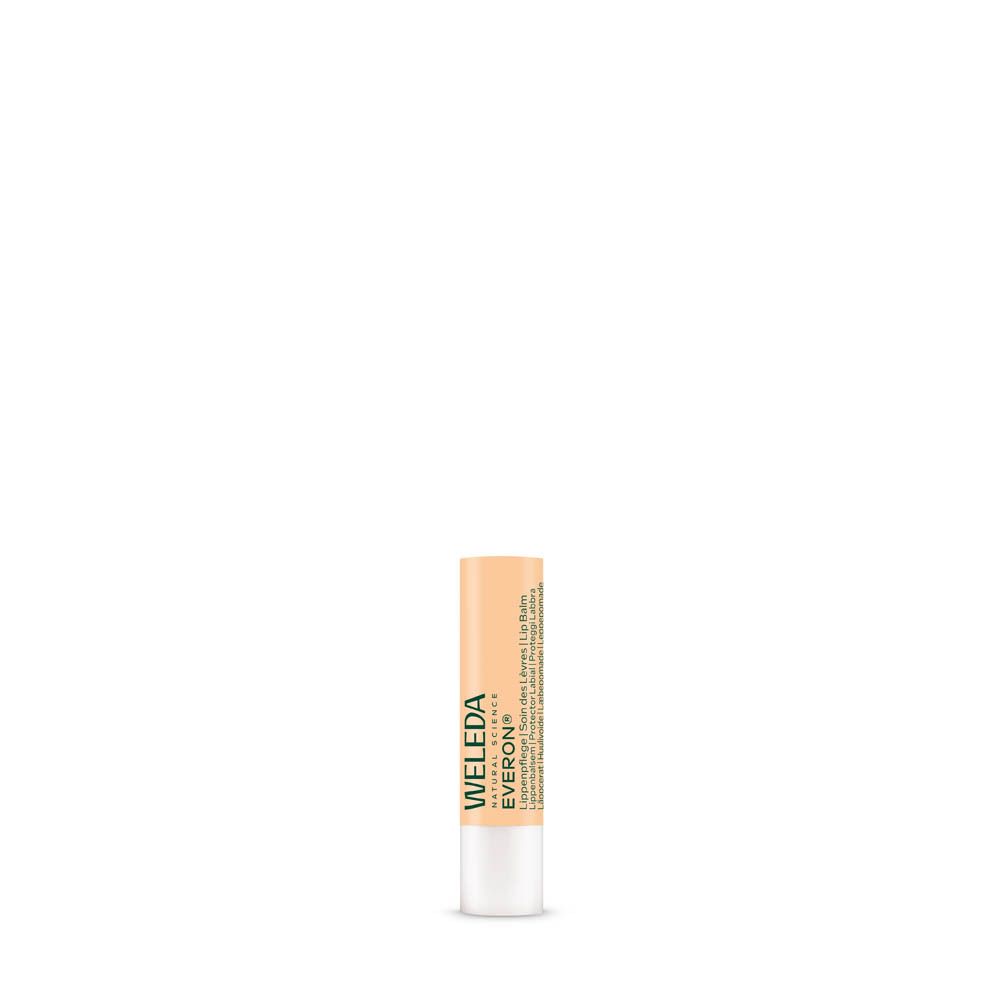 Stick de soin des lèvres Weleda Everon®. Beige avec base blanche. Le produit est debout.