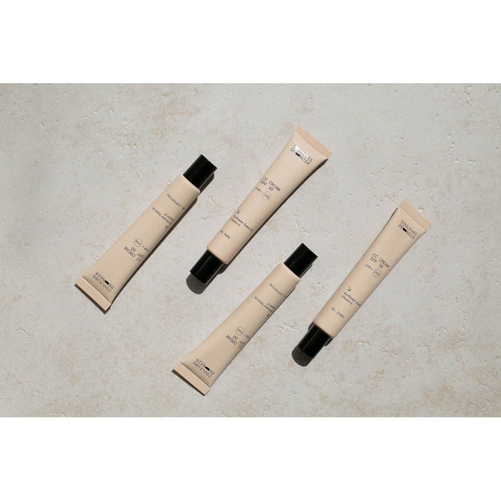 Produit et emballage. Inscription: Couleurs de Noir, CC CREAM 02 SPF30, Colour Correcting Cream.