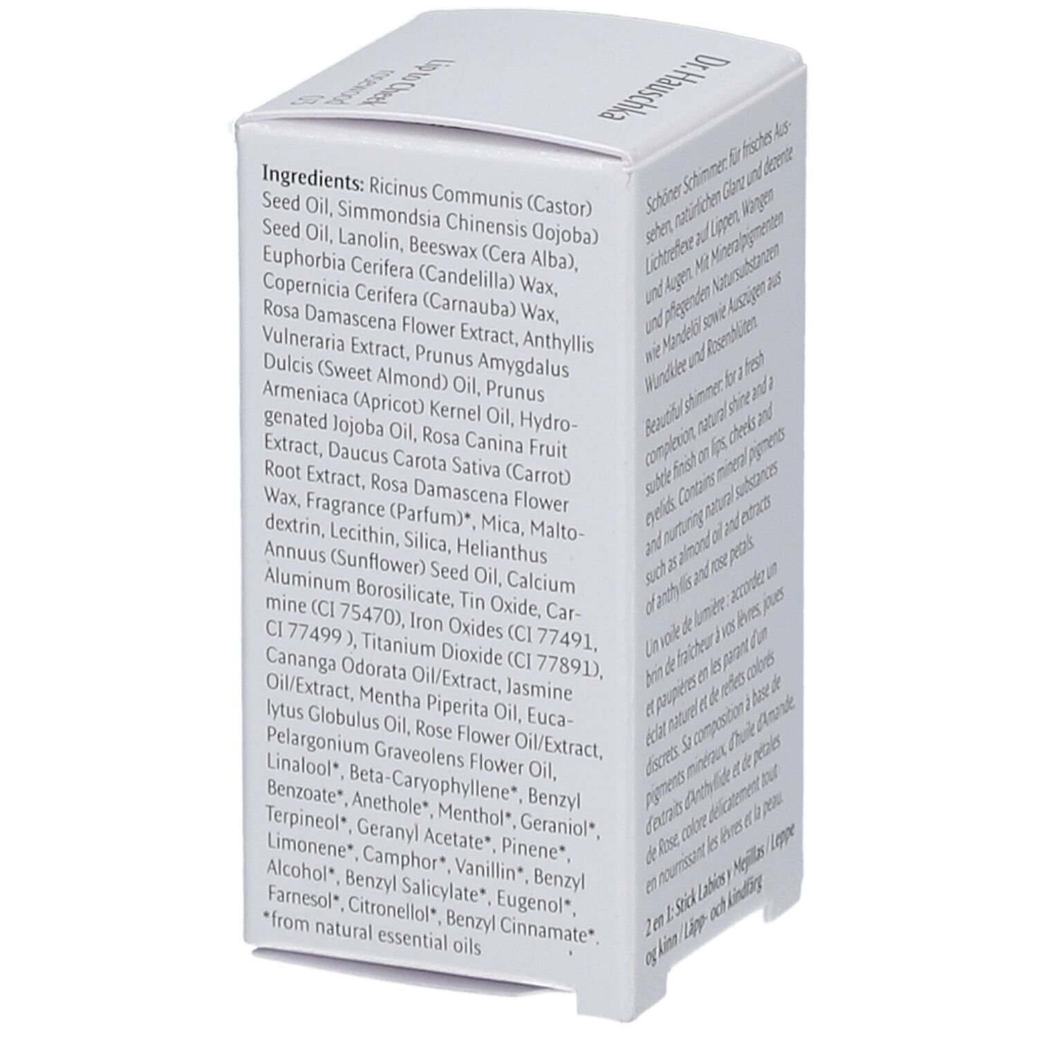 Weiße Verpackung mit Inhaltsstoffen. Aufschrift: Ricinus Communis Seed Oil, Simmondsia Chinensis Seed Oil, Cera Alba, etc.