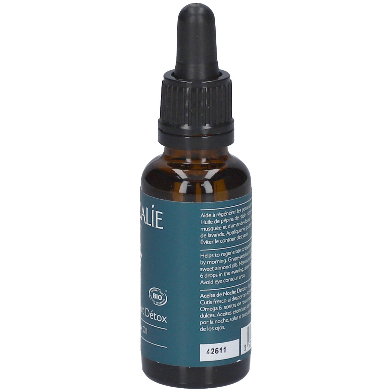 Braune Glasflasche mit Pipette. Aufschrift: Caudalie, Huile de Nuit Détox, Overnight Detox Oil. Text auf Französisch. Bio-Siegel.