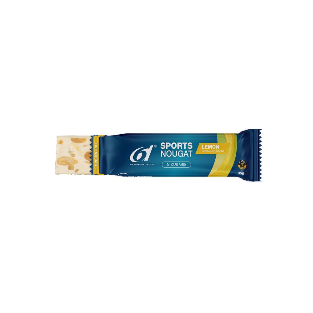 Barre de nougat au citron. Emballage bleu avec texte blanc. Partiellement ouvert, nougat visible.