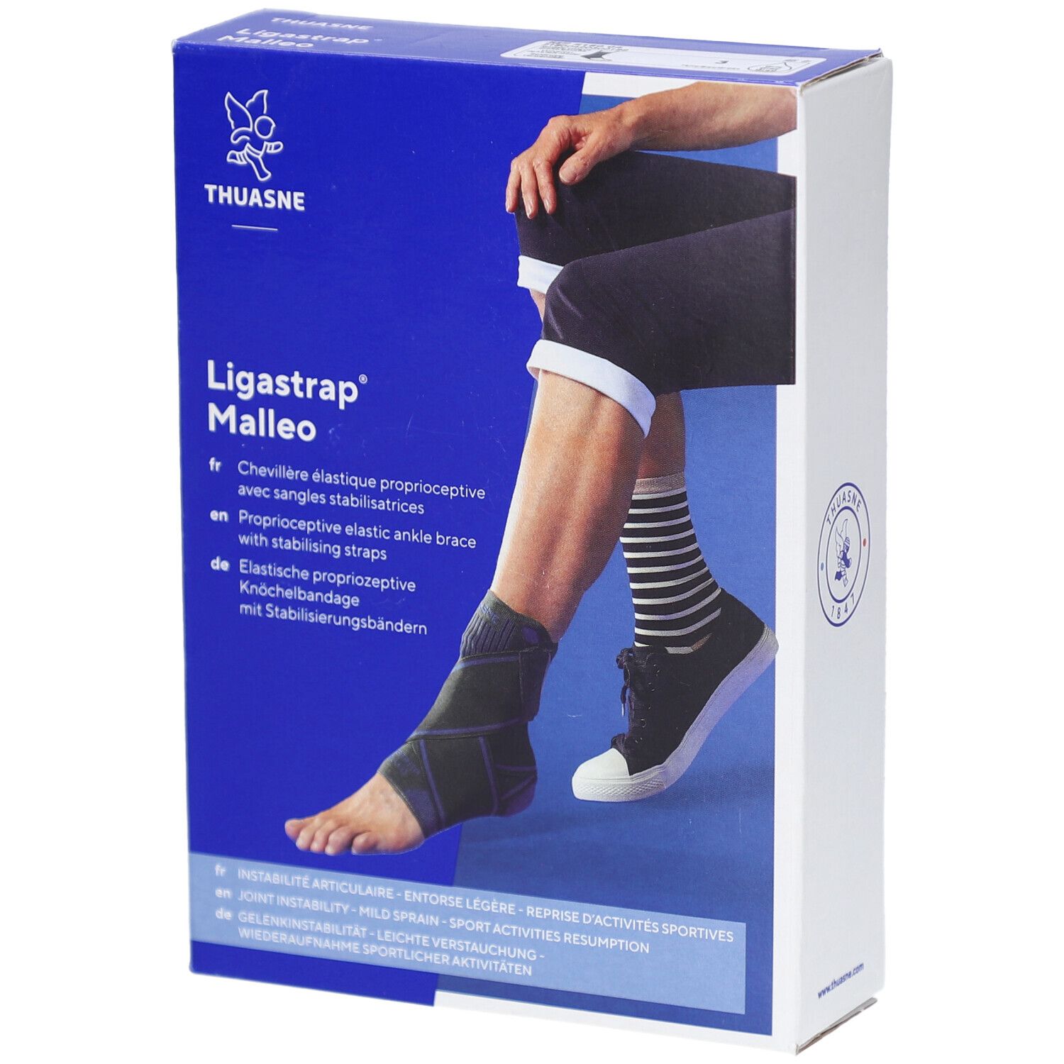 Blau-weiße Verpackung mit Knöchelbandage. Text: Ligastrap Malleo, Thuasne. Abbildung eines Fußes mit Bandage.