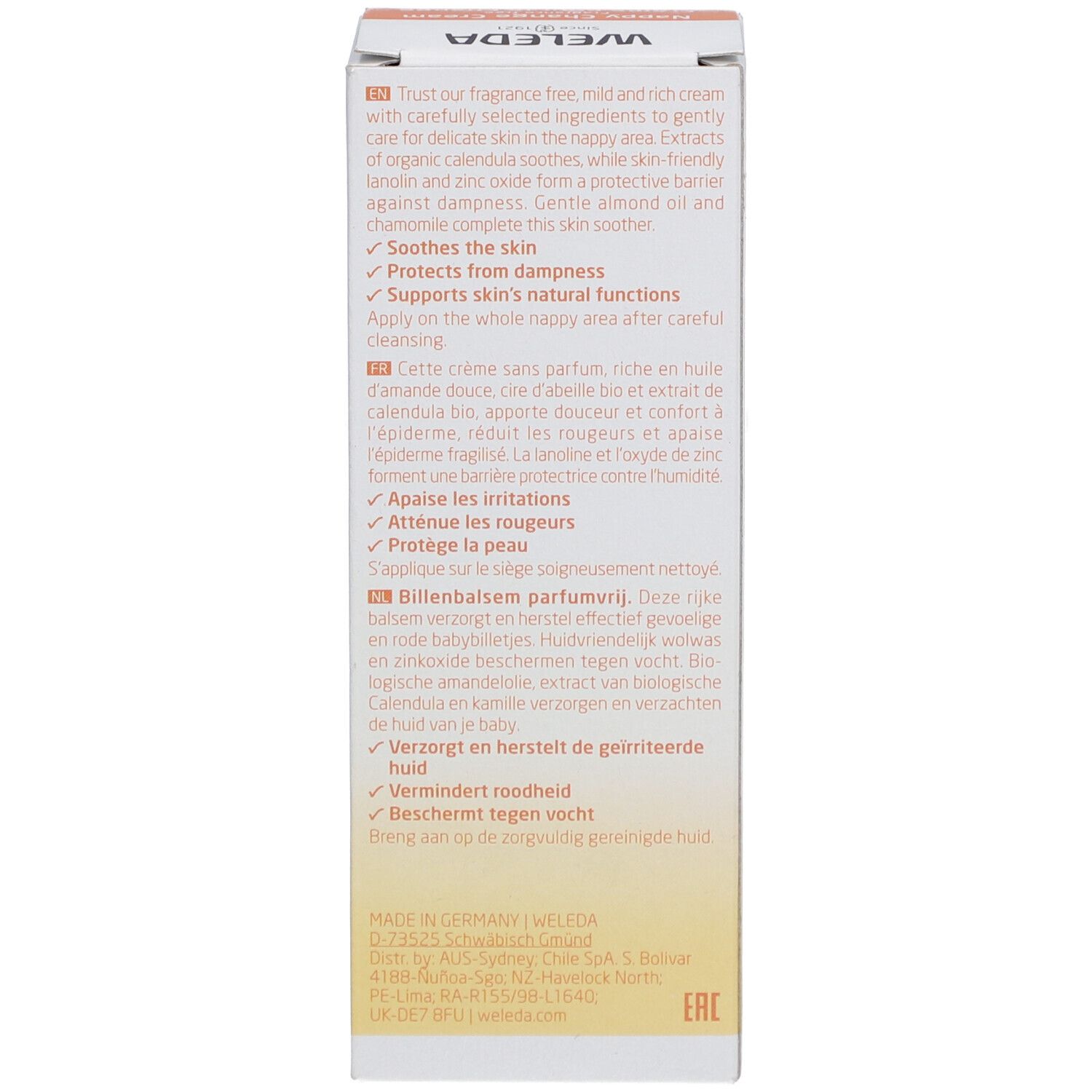 Rückseite der Weleda Baby Windelcreme Verpackung. Text in mehreren Sprachen, Produktinformationen.