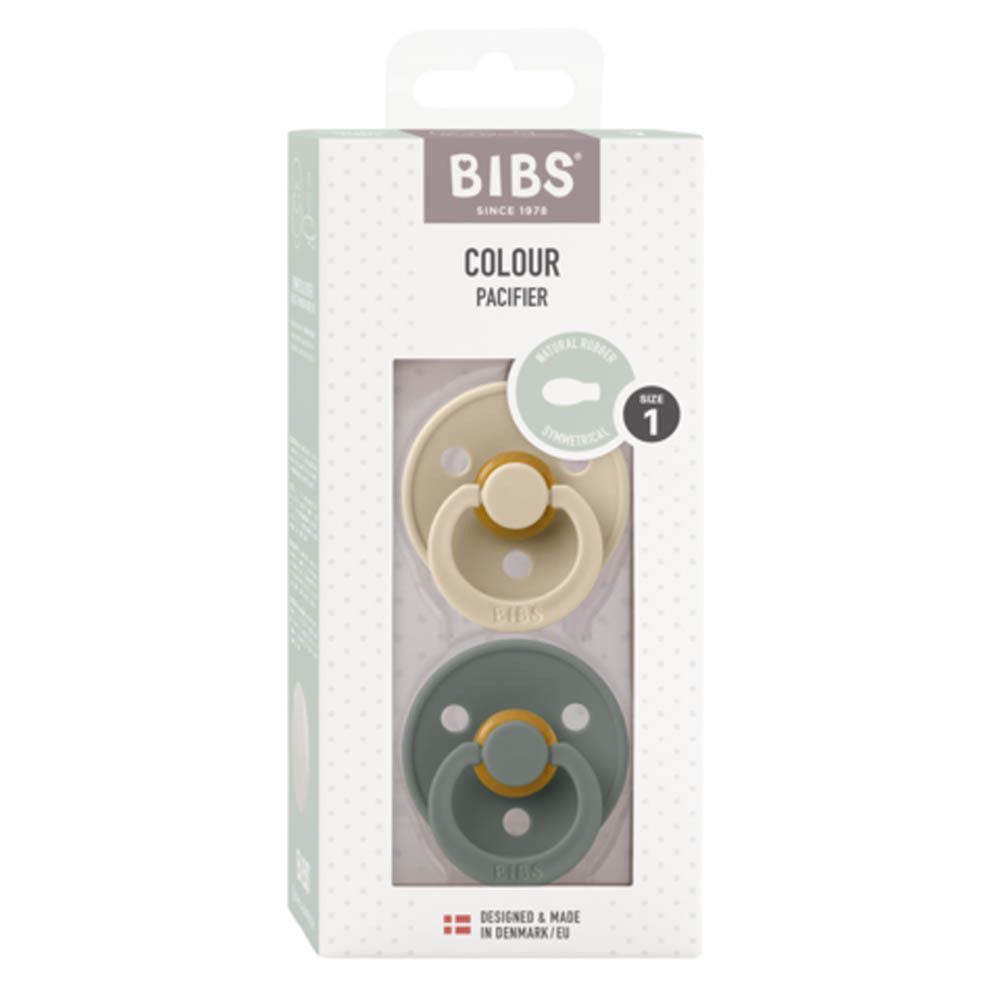 Verpackung mit zwei Schnullern. BIBS-Marke. Farben: Beige und Grün. Größe 1, 0-6 Monate.