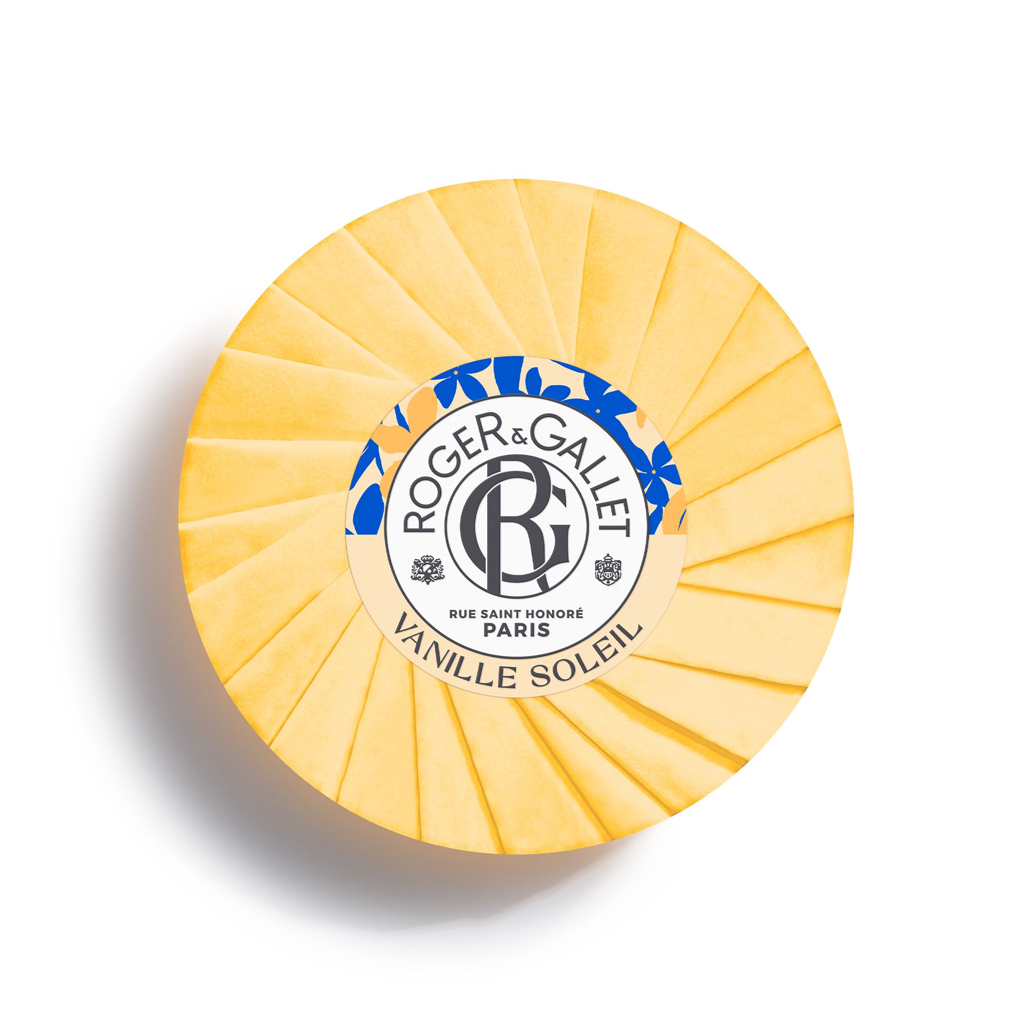 Savon rond avec emballage papier jaune. Inscription: Roger & Gallet Vanille Soleil.