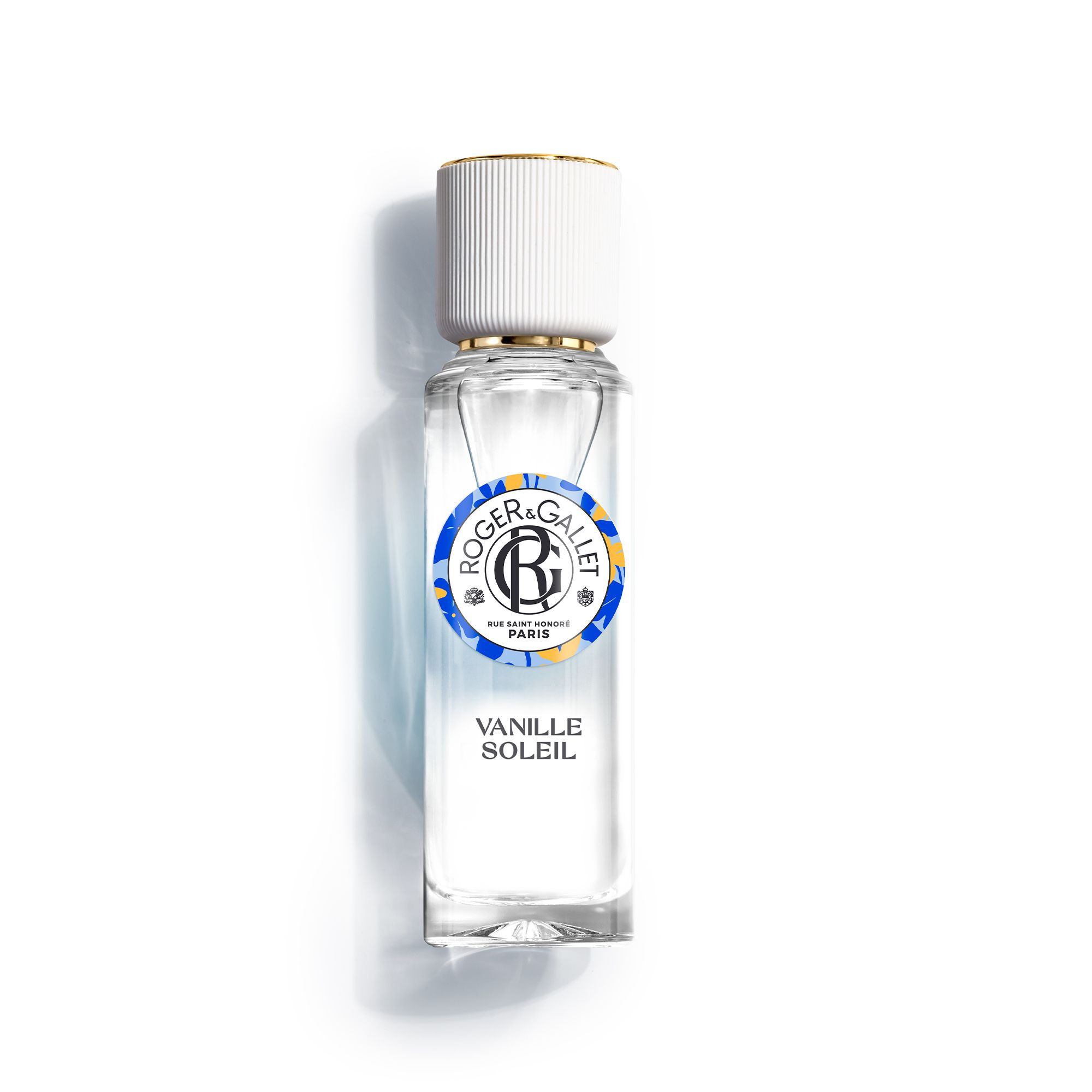 Flacon de parfum avec bouchon blanc. Étiquette avec logo et texte Vanille Soleil. Marque: Roger&Gallet.