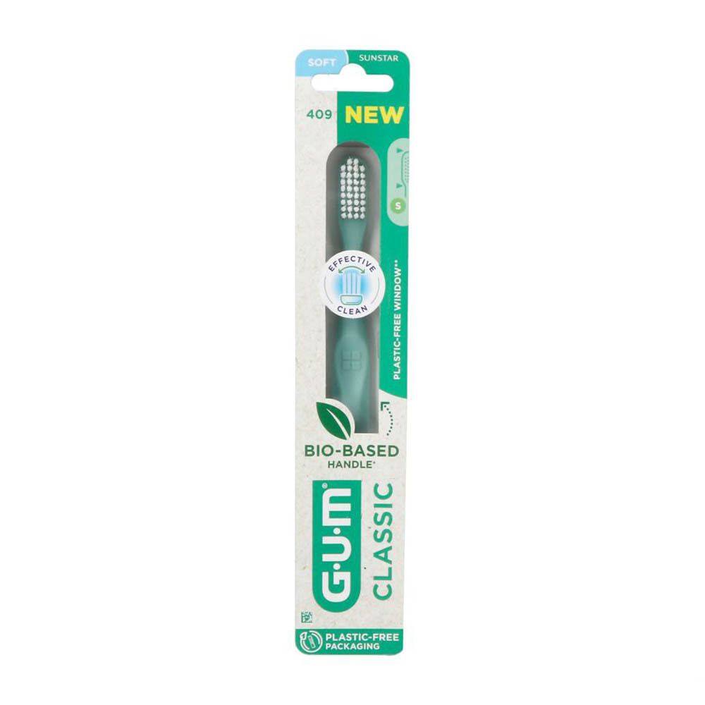 Brosse à dents GUM Classic Compact Soft 409 en emballage. Manche vert, tête blanche. Bio-sourcé, sans plastique.