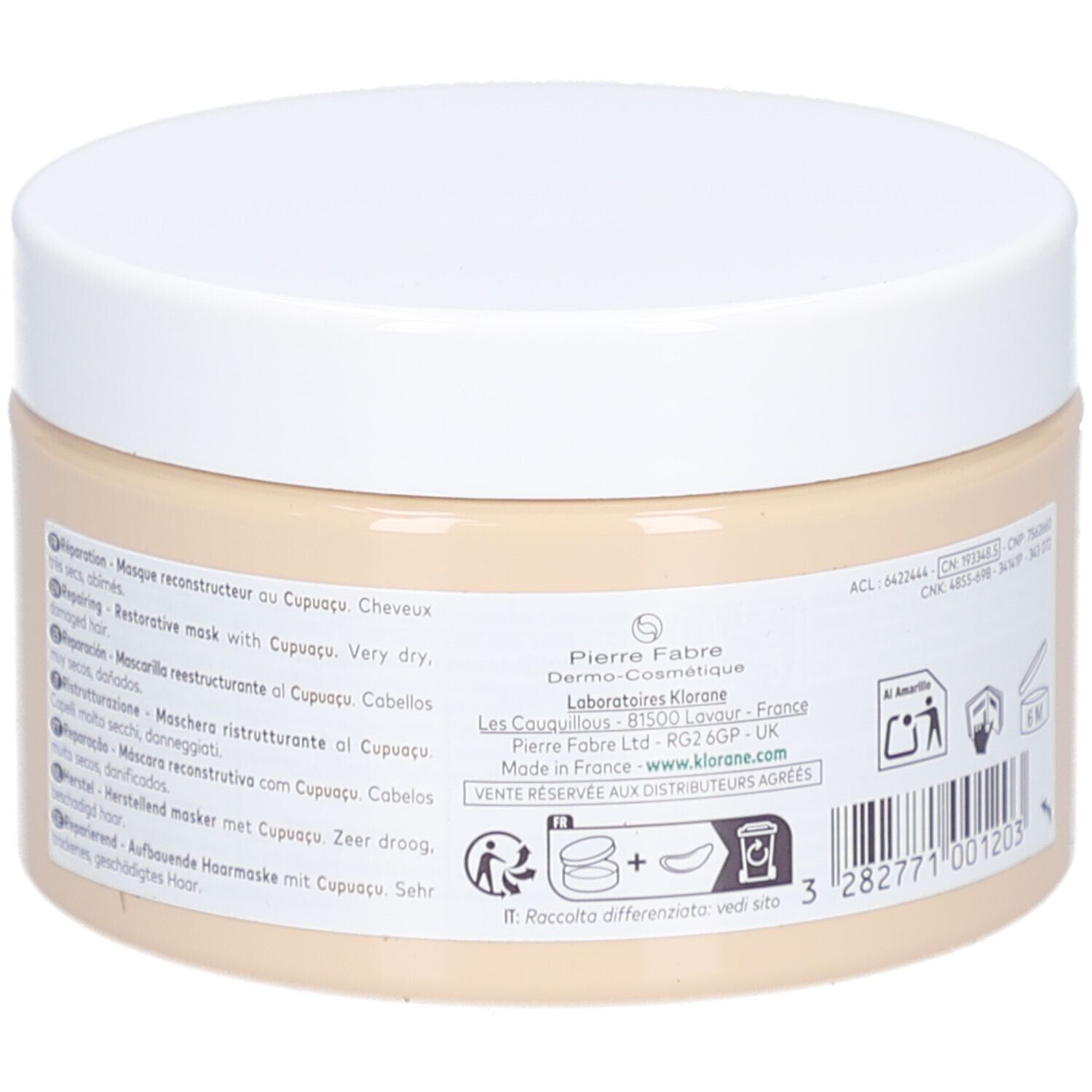 Beige Tiegel mit weißem Deckel. Aufkleber mit Text in mehreren Sprachen. Herstelleradresse und Barcode.