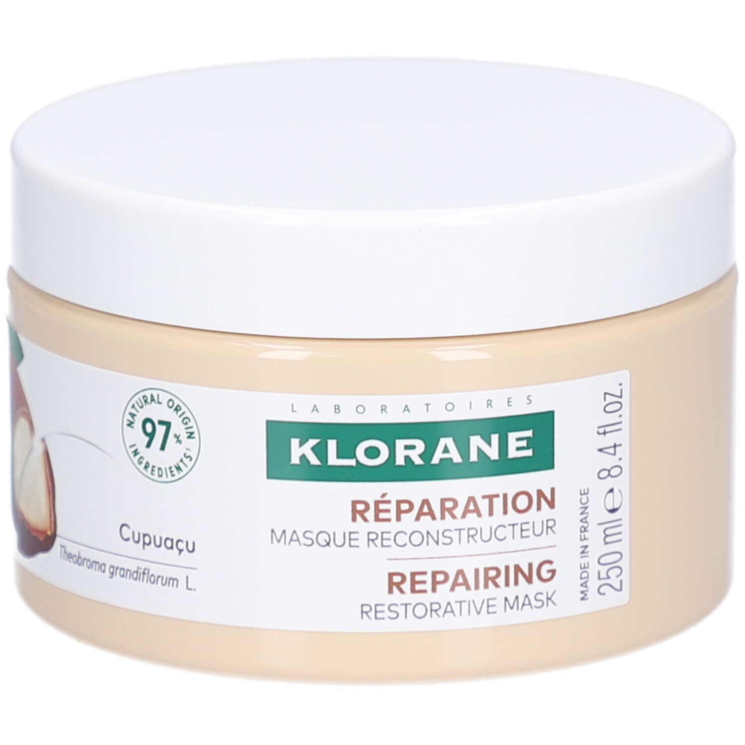 Beige Tiegel mit weißem Deckel. Aufkleber mit Logo, Text und Volumenangabe: 250 ml.