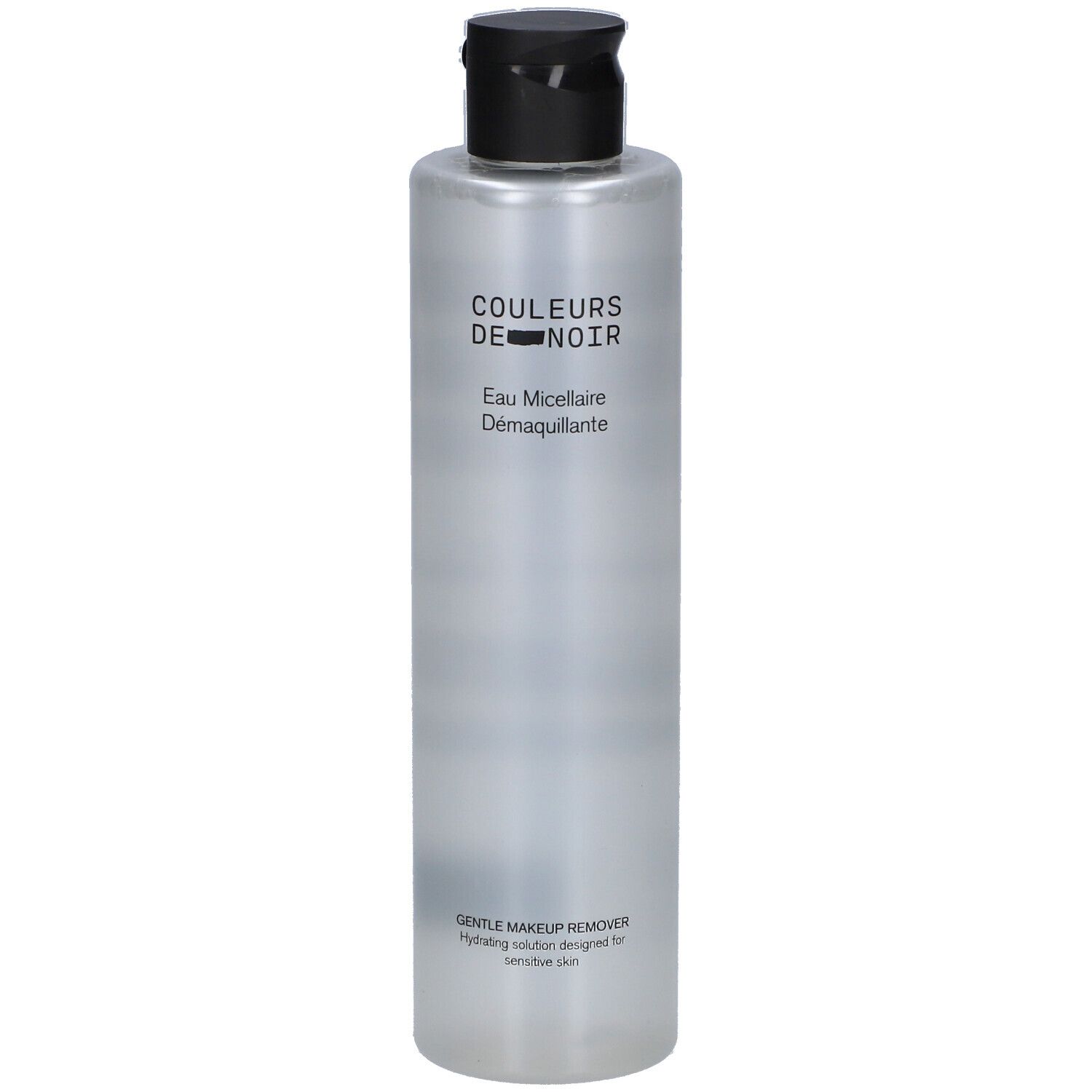 Zylindrische Flasche mit schwarzem Deckel. Aufschrift: Couleurs de Noir, Eau Micellaire Démaquillante. Sanfte Make-up-Entferner.