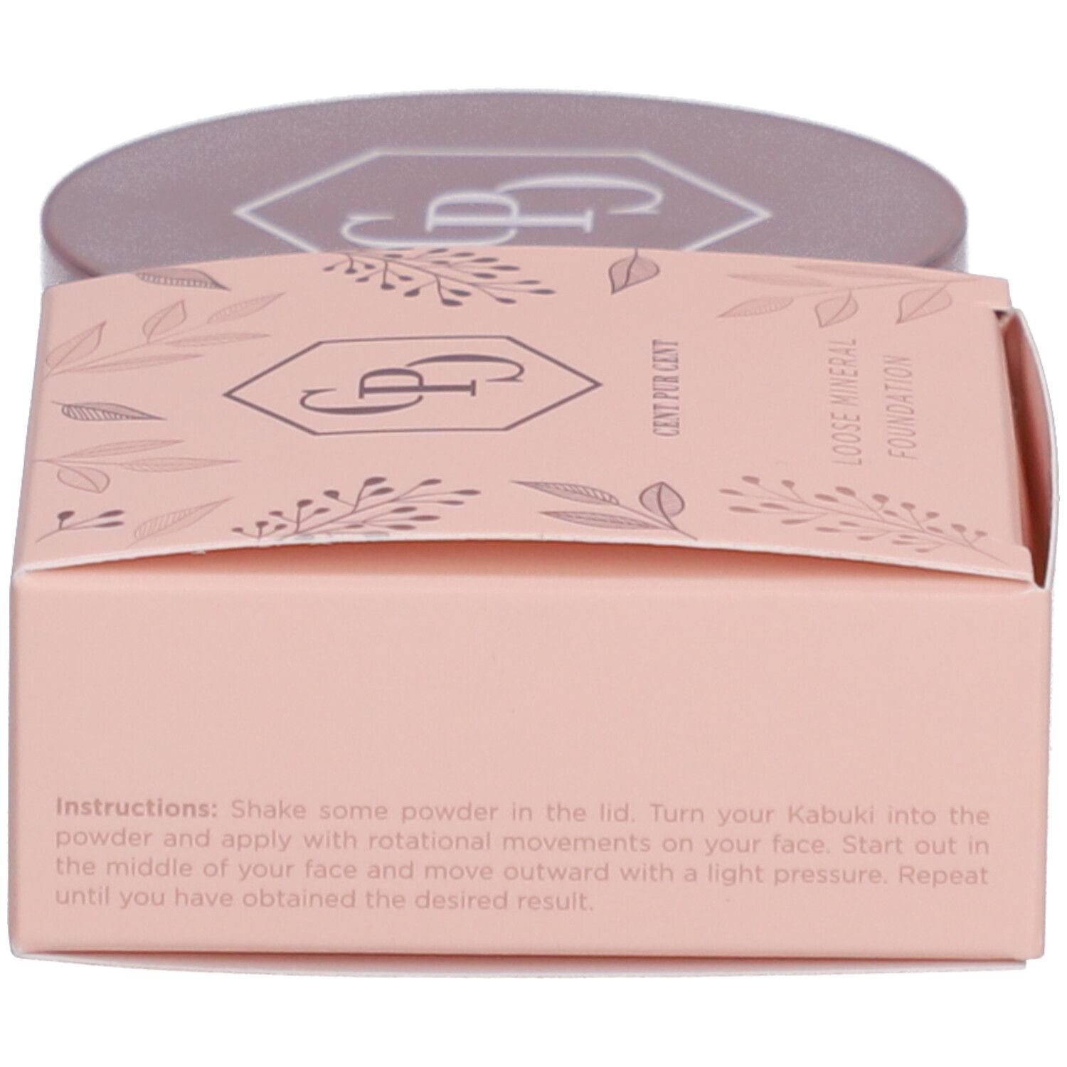 Boîte rose avec informations sur le produit. Texte : Loose Mineral Foundation, Lightweight Skin Improving Foundation. Instructions.