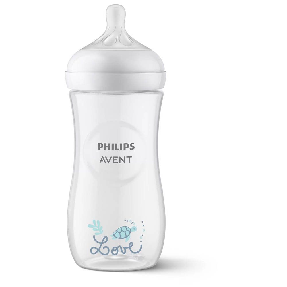 Biberon Philips Avent avec du lait. Couvercle blanc, biberon transparent. Logo et texte.