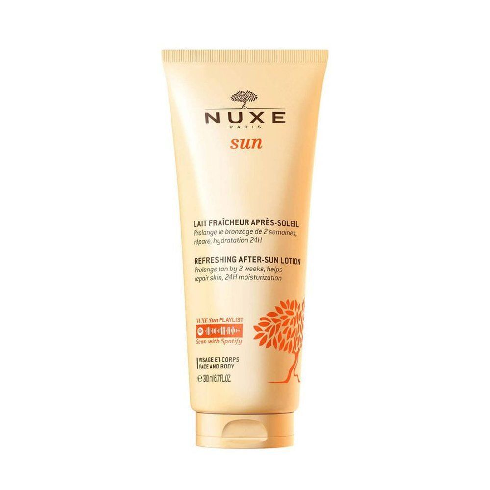 Lait Fraîcheur Après-Soleil Nuxe Sun en tube doré, motif arbre et soleil.