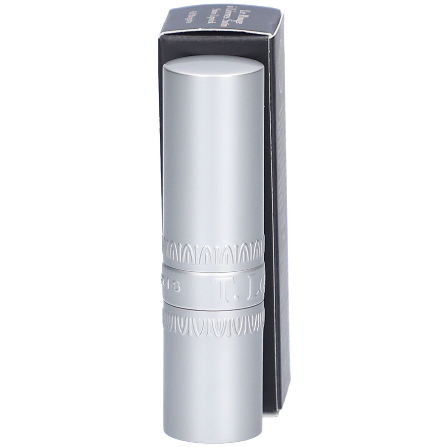 Silberner Lippenstift und Verpackung. Schwarze Schachtel mit Text: T. LeClerc Paris. Lippenstift mit Muster.