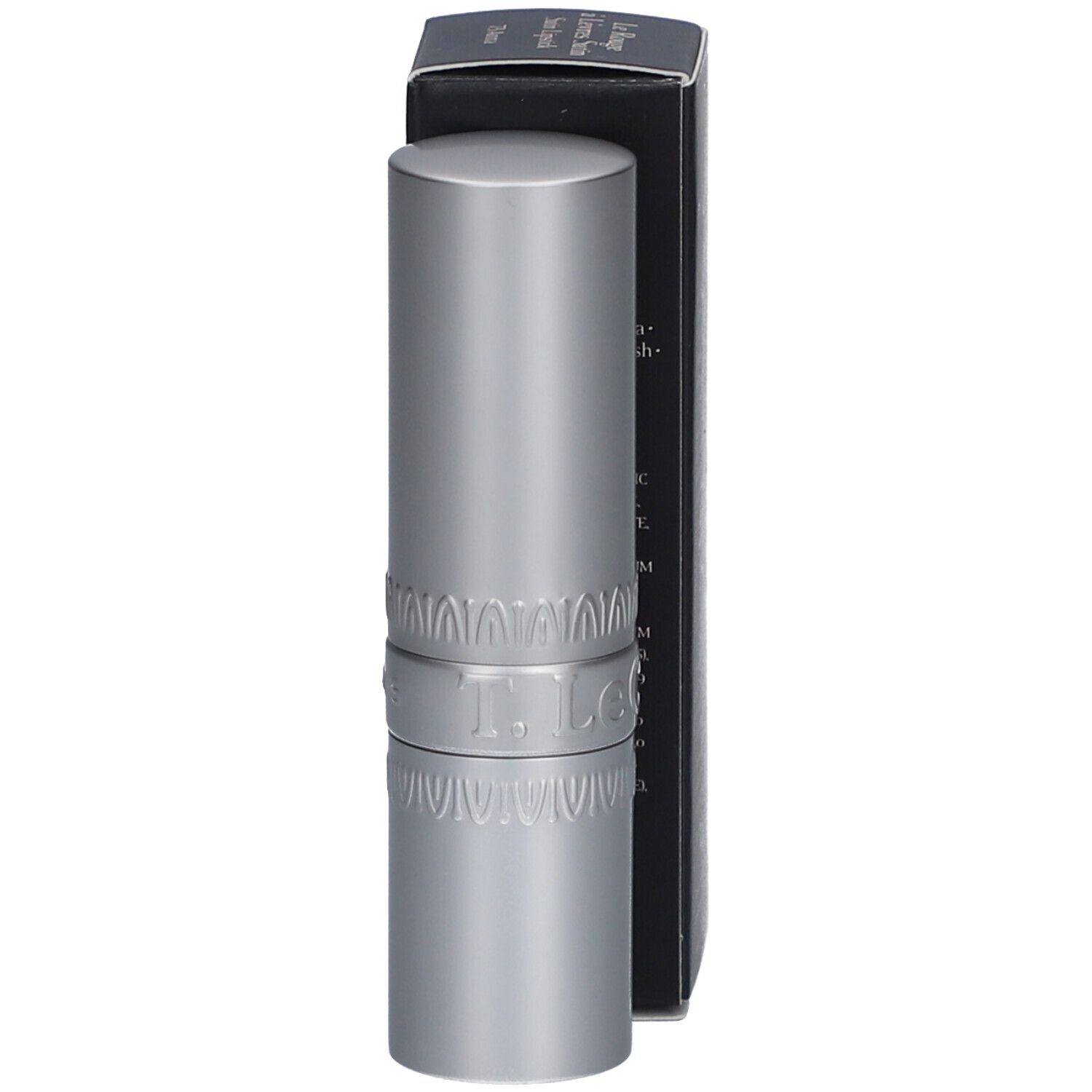 Lippenstift und Schachtel. Silberfarbener Lippenstift, schwarze Schachtel mit Produktinformationen. Marke: T. LeClerc.