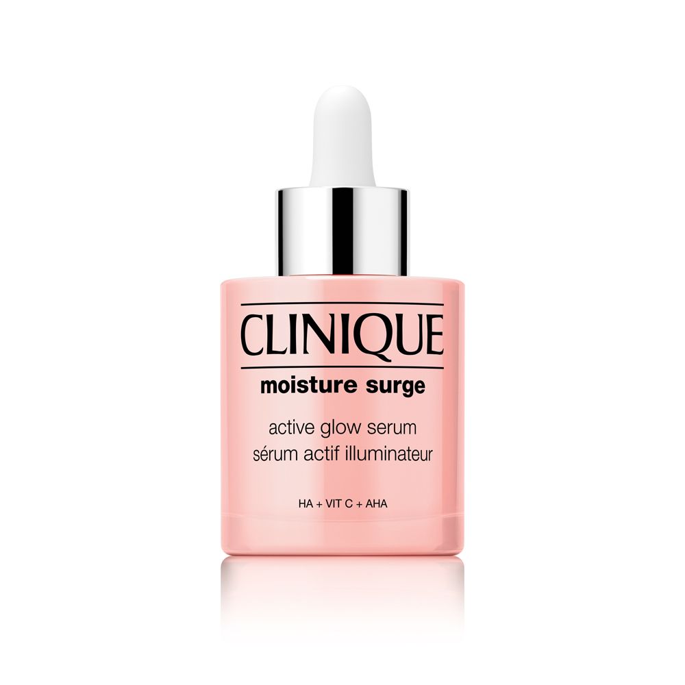 Flacon rose avec compte-gouttes blanc. Inscription CLINIQUE, Moisture Surge, sérum actif illuminateur. HA + VIT C + AHA.