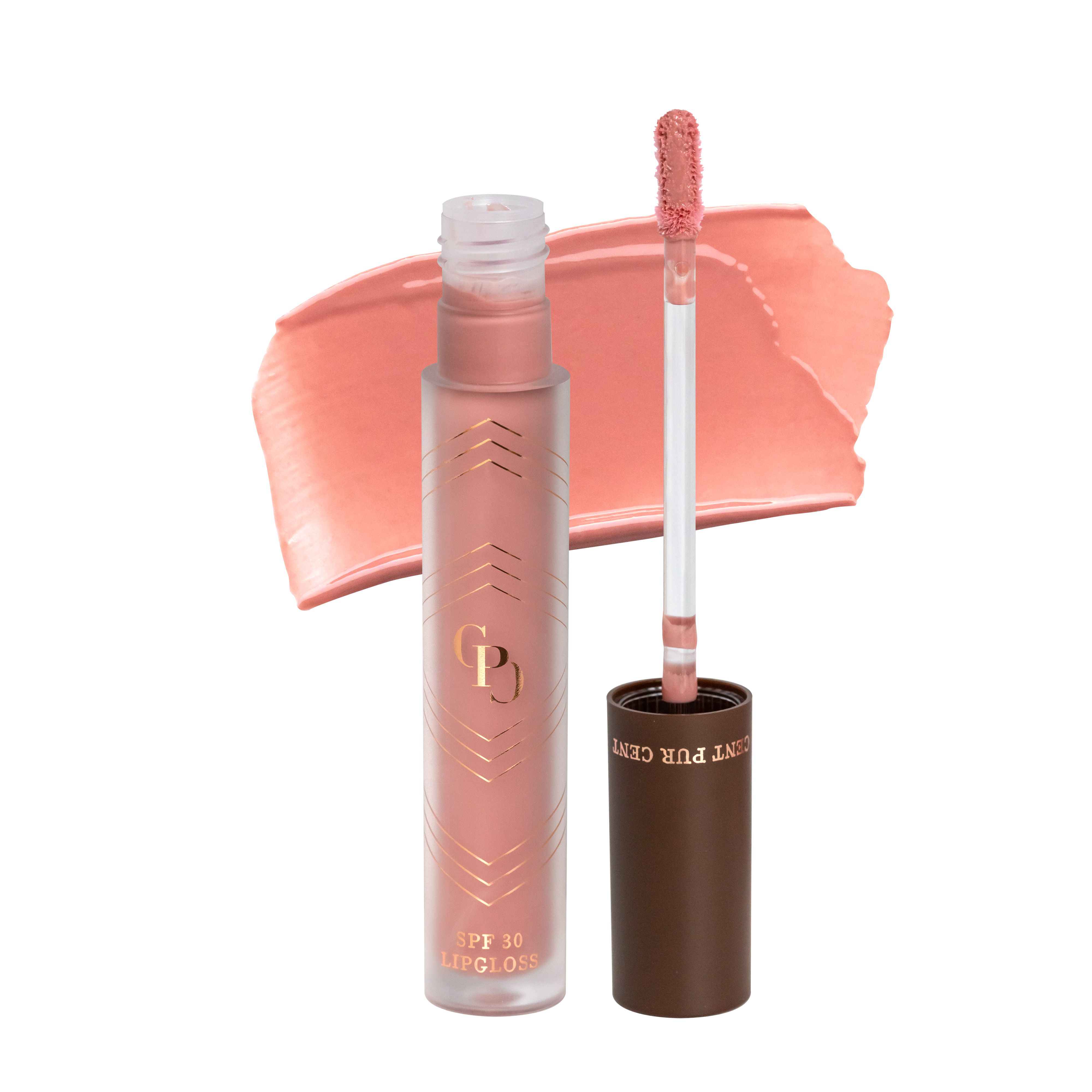 Tube de gloss avec bouchon marron. Contenu rose. Motif géométrique. Inscription: Cent Pur Cent, SPF 30 Lipgloss.