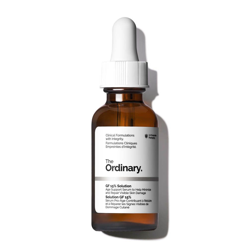 Flacon en verre brun avec compte-gouttes blanc. Marque : The Ordinary. Sérum GF 15% Solution.