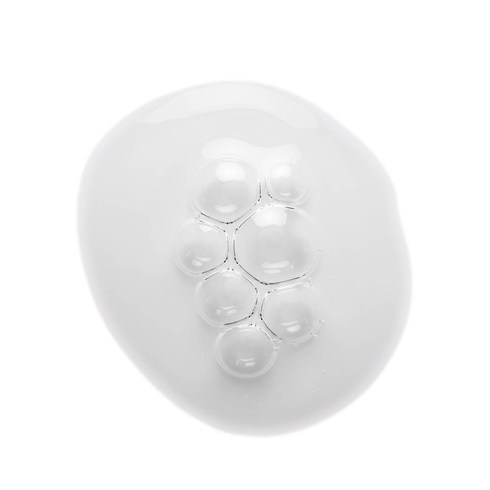 Liquide blanchâtre avec bulles. Produit : The Ordinary GF 15% Solution Serum.
