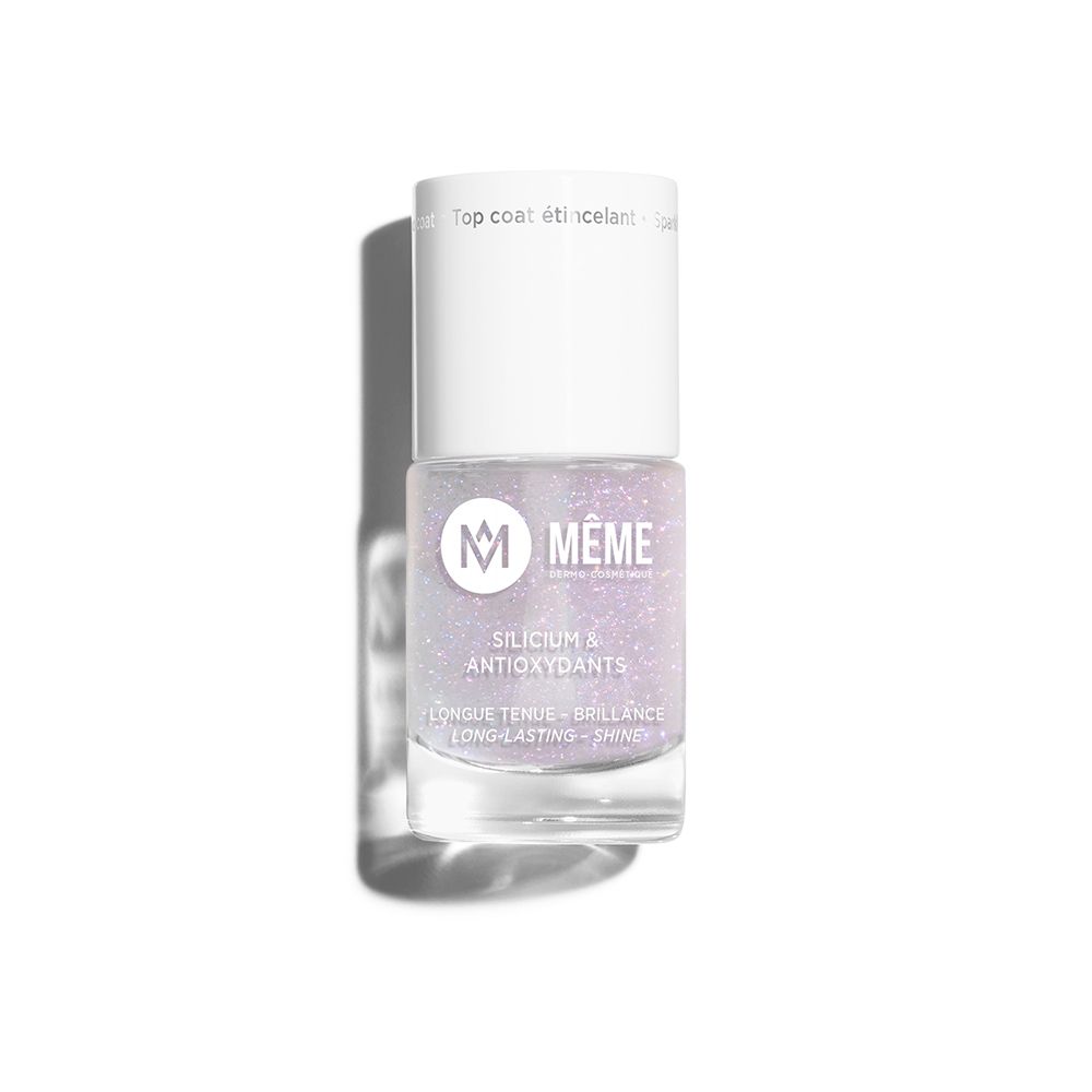 Flacon de vernis à ongles avec bouchon blanc. Inscriptions: MEME, Silicium & Antioxydants. Liquide transparent scintillant.