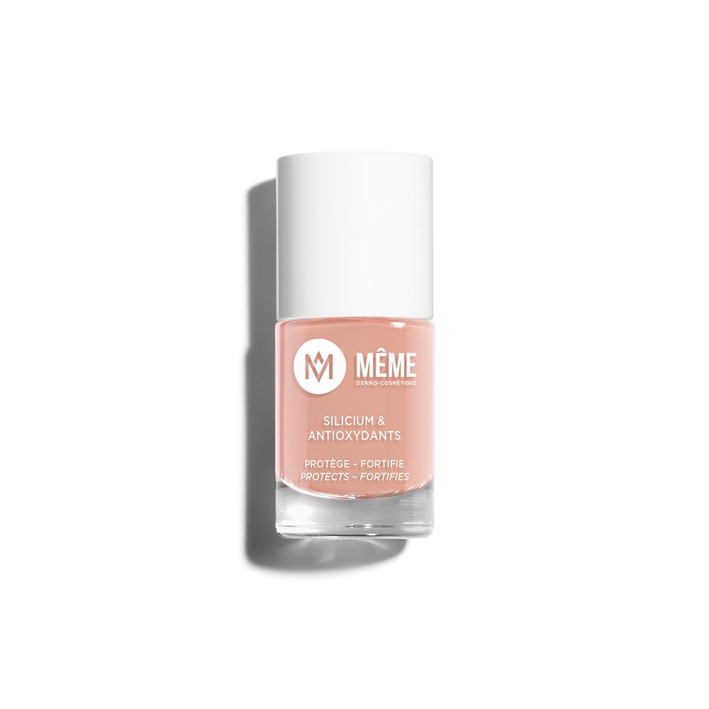 Flacon de vernis à ongles beige. Bouchon blanc, flacon transparent. Inscription: MEME, Silicium & Antioxidants.