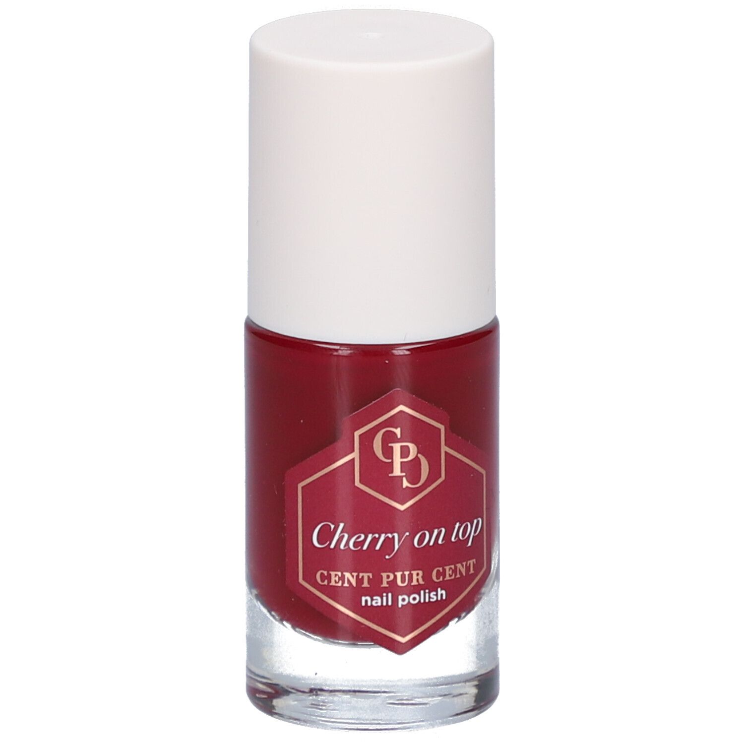 Nagellackflasche mit rotem Lack und weißem Deckel. Auf dem Etikett steht "Cherry on top" und "CENT PUR CENT nail polish".
