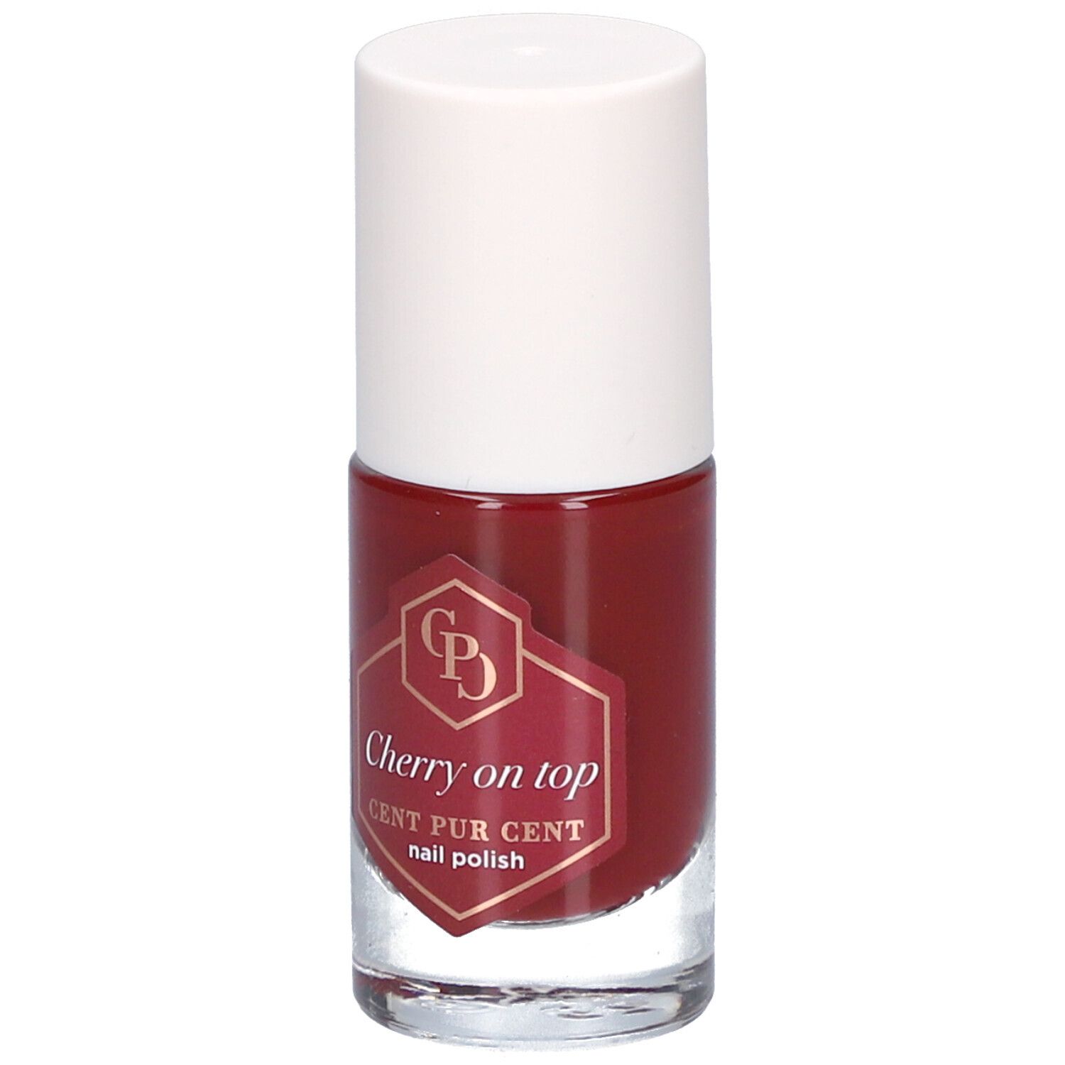 Nagellackflasche mit rotem Lack und weißem Deckel. Auf dem Etikett steht "Cherry on top" und "CENT PUR CENT nail polish".