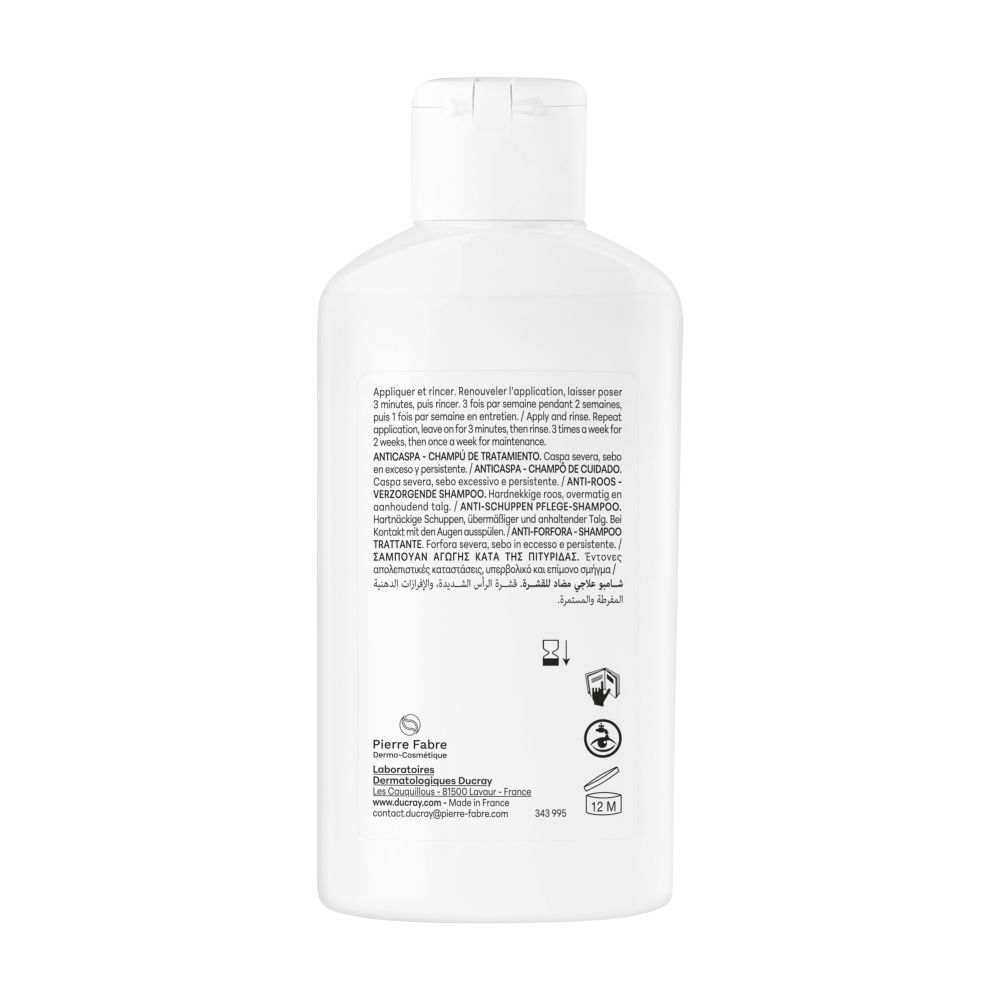 Rückseite einer Ducray Kelual DS Shampoo-Flasche mit Anwendungshinweisen.