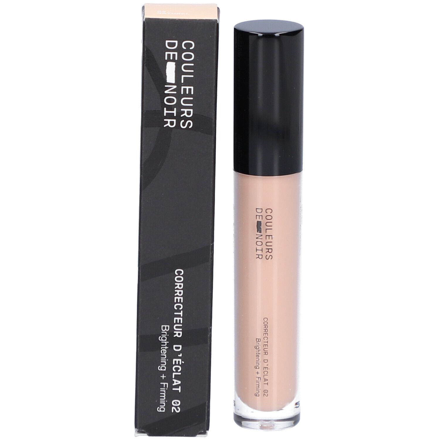 Concealer-Stift und Verpackung. Aufschrift: COULEURS DE NOIR, Correcteur d’éclat 02 Naturel. Schwarze Verpackung.