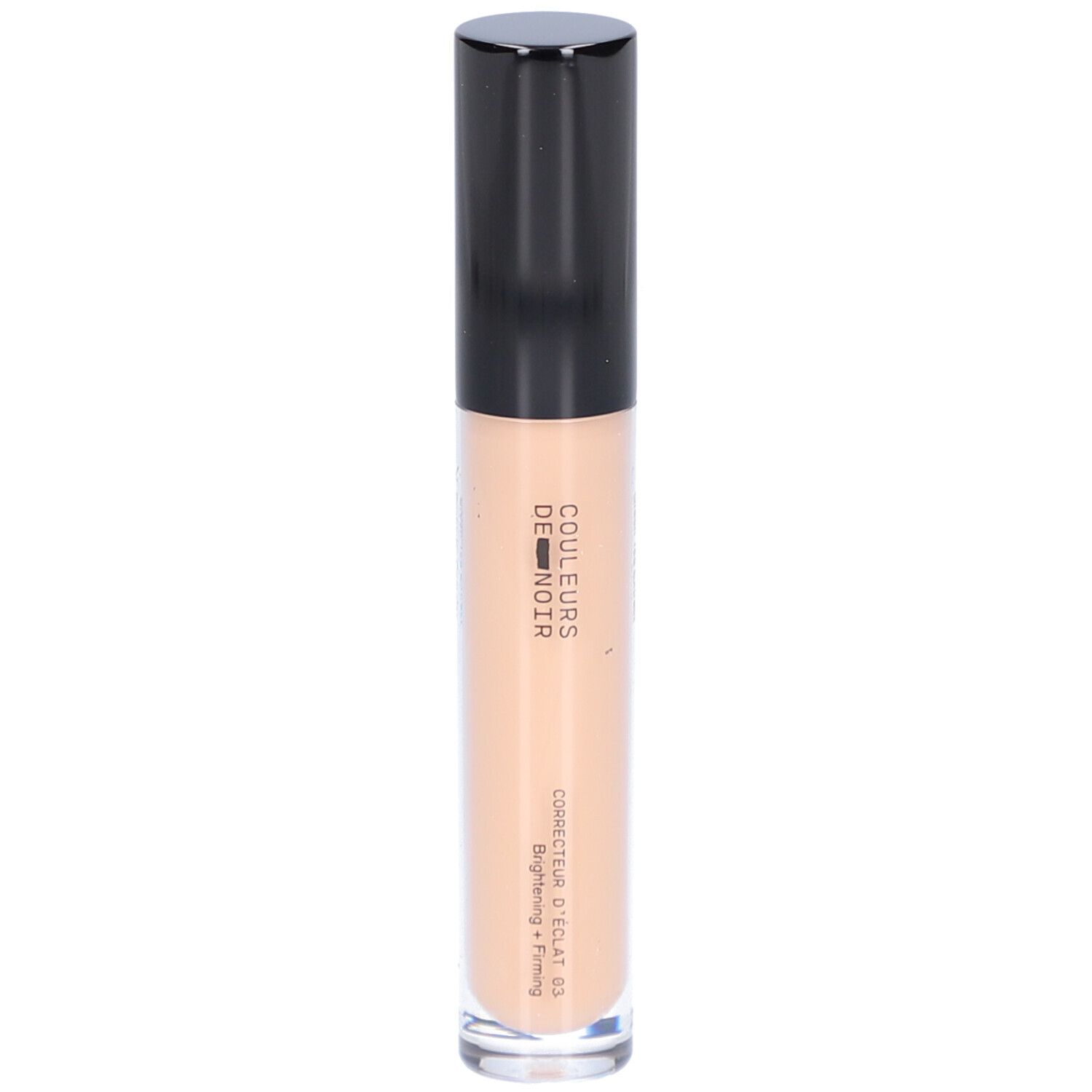 Beige Concealer-Tube mit schwarzem Deckel. Aufschrift: COULEURS DE NOIR, Correcteur d’éclat 03 Moyen. Hellt auf und strafft.