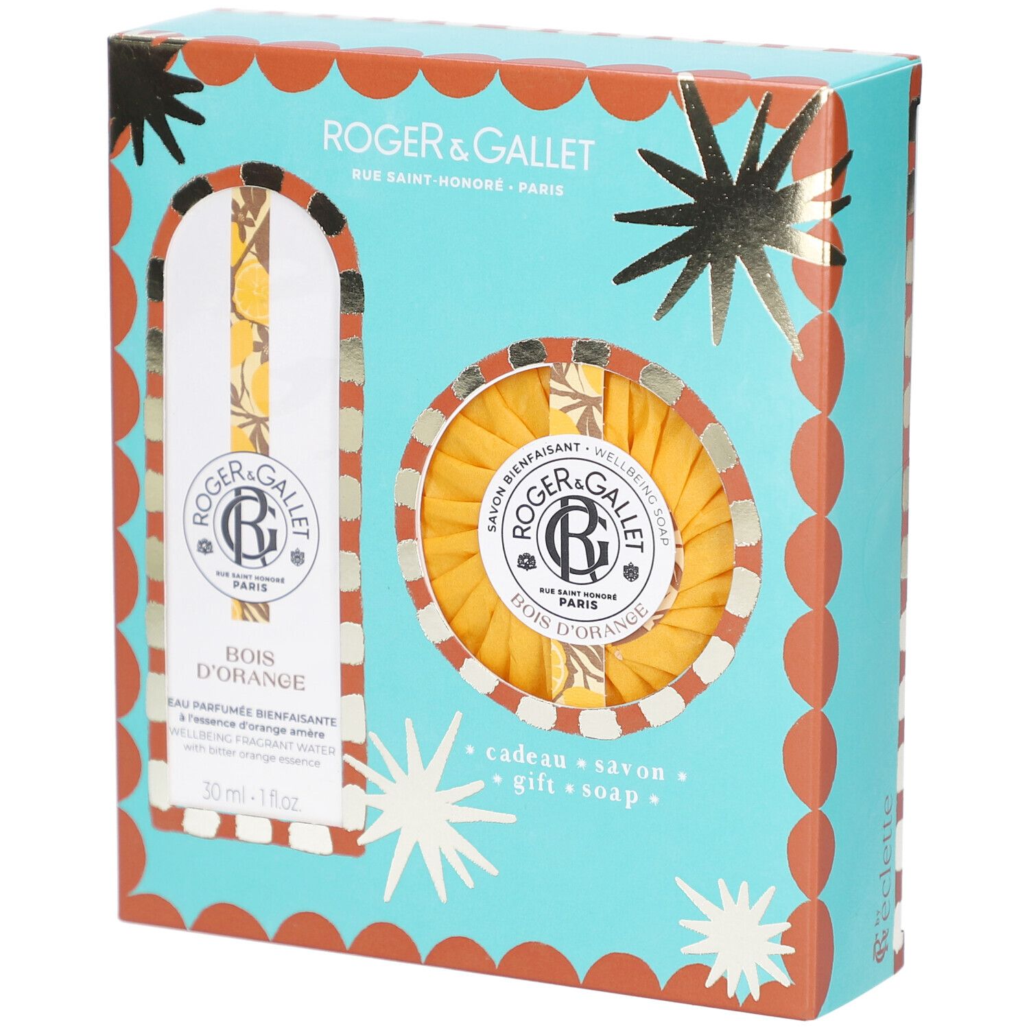 Geschenkset mit Eau Parfumée und Seife. Türkisfarbene Schachtel mit Sternen und orangefarbenen Details. Logo und Produktnamen sichtbar.