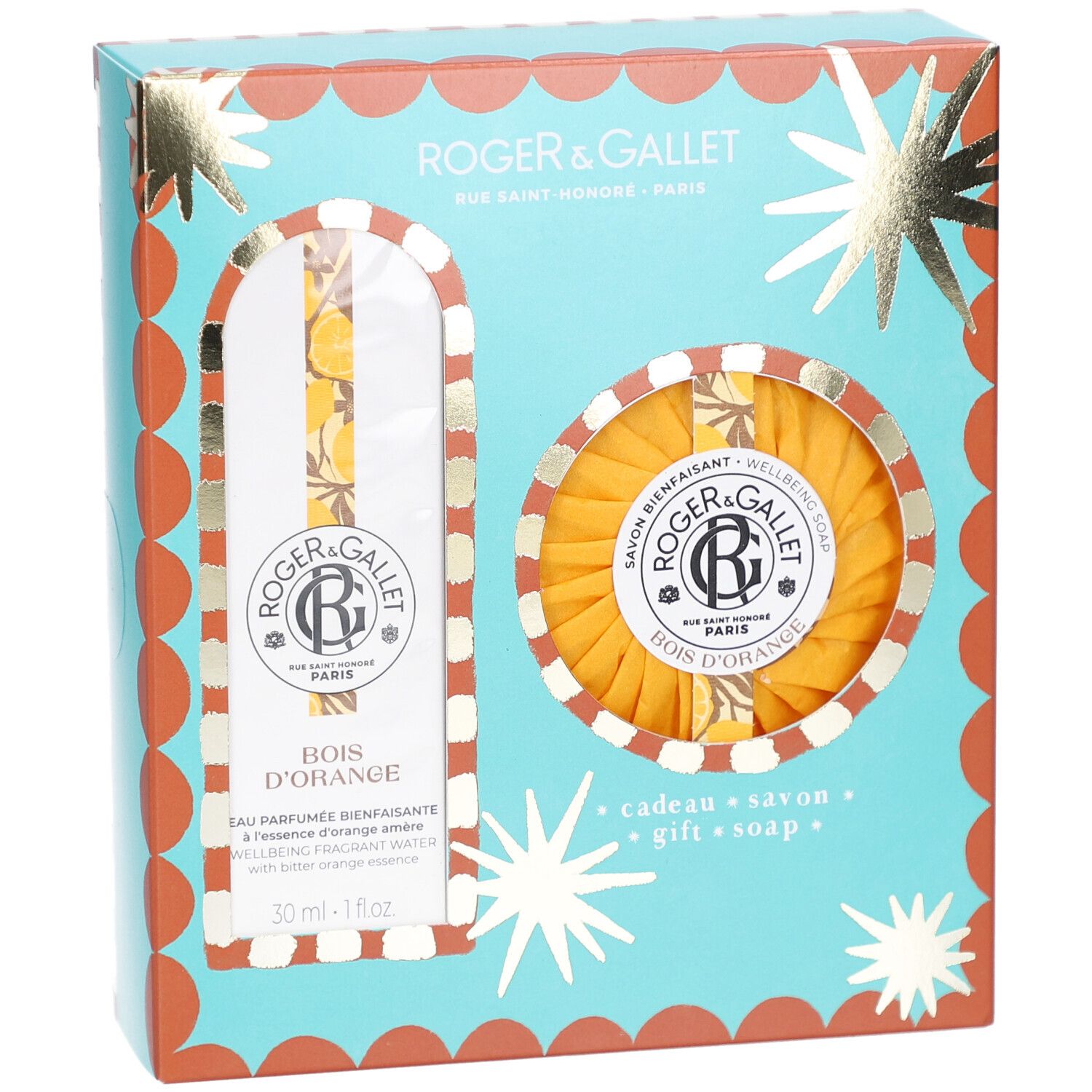 Geschenkset mit Eau Parfumée und Seife. Türkisfarbene Schachtel mit Sternen und orangefarbenen Details. Logo und Produktnamen sichtbar.