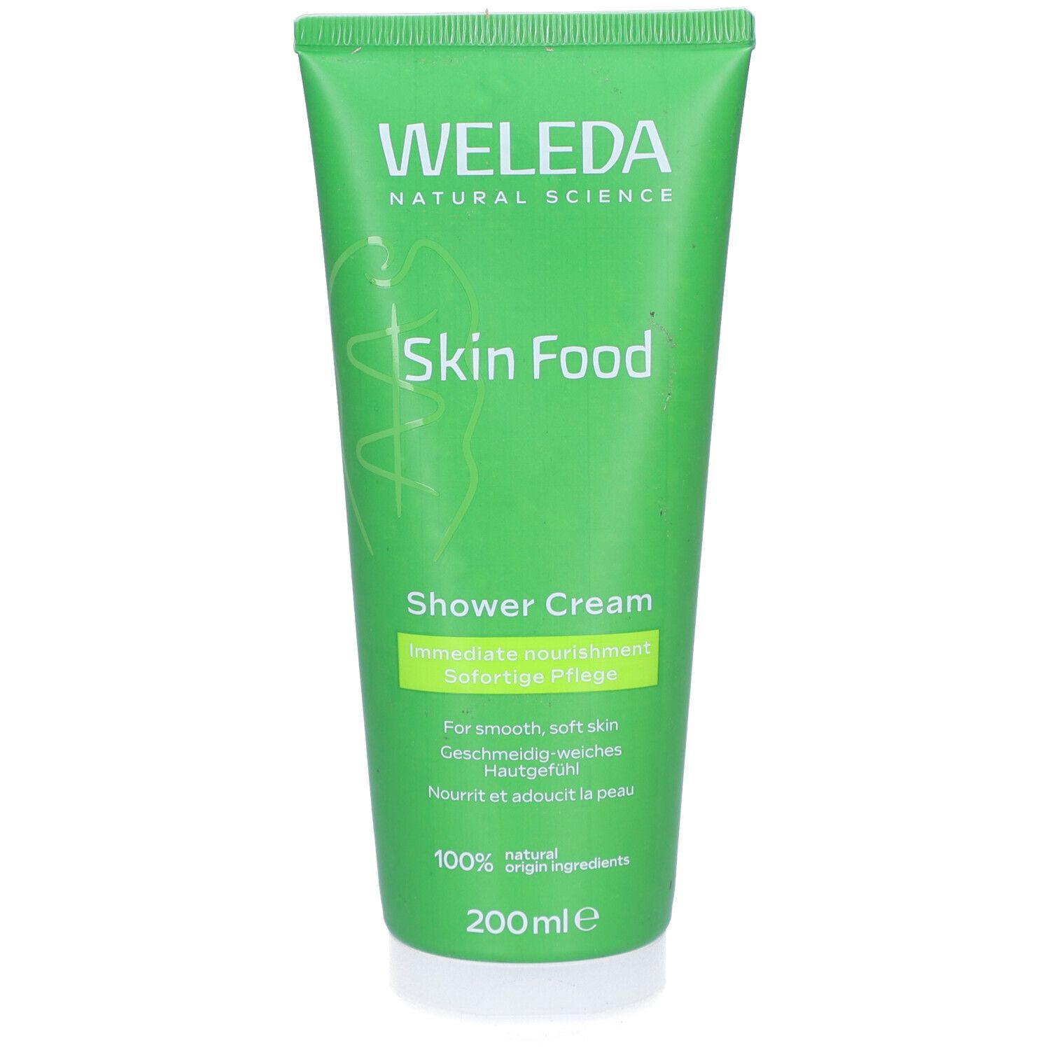Grüne Tube mit weißem Verschluss. Aufschrift: WELEDA, Skin Food, Shower Cream. Text in Deutsch und Englisch. 100% natürliche Inhaltsstoffe.