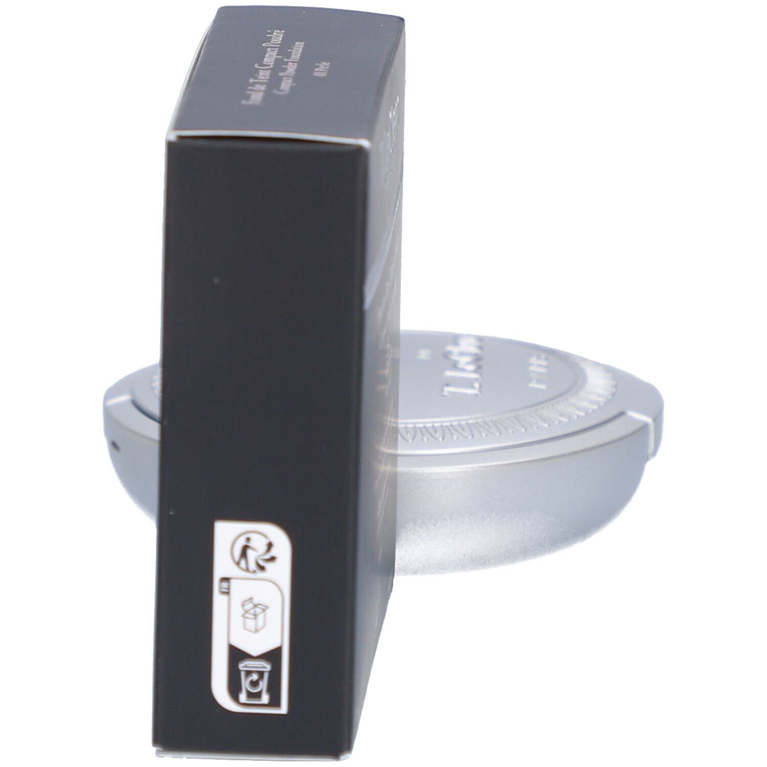 Schwarze Schachtel und silberfarbener Behälter. Recycling-Symbole auf der Schachtel.