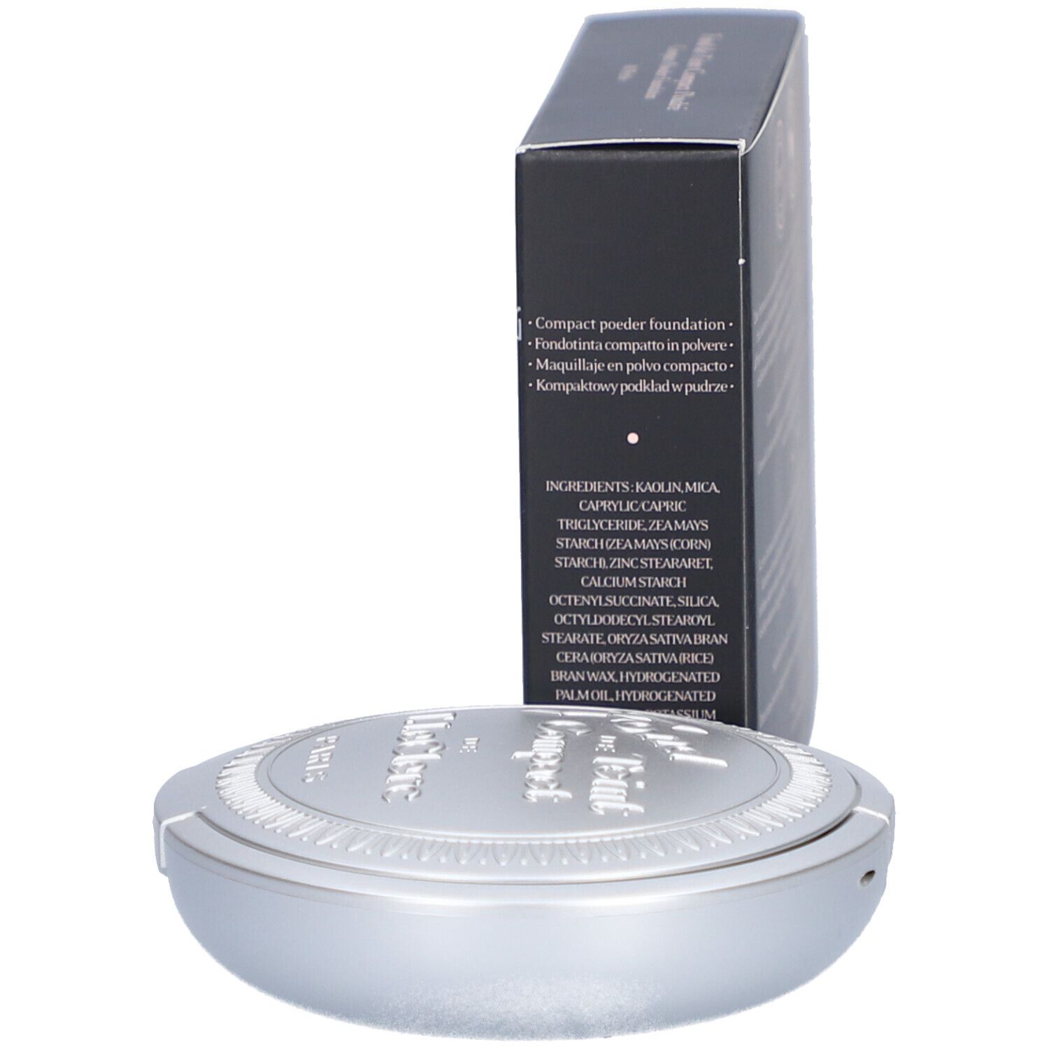 Kompaktpuder-Foundation und Schachtel. Text auf der Schachtel, silberfarbener Behälter.