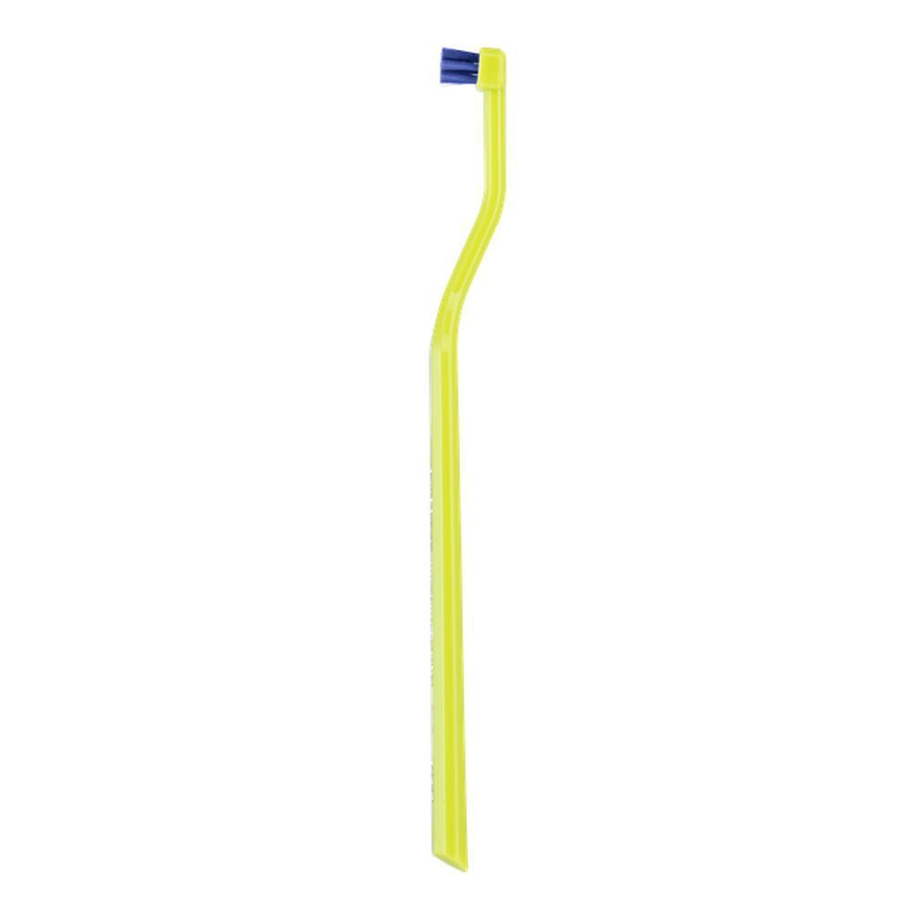 Brosse à dents jaune avec tête bleue. Forme courbée.