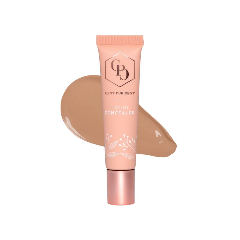 Cent Pur Cent Correcteur Liquide 1.0 dans un tube beige clair avec bouchon or rose et une touche de correcteur.