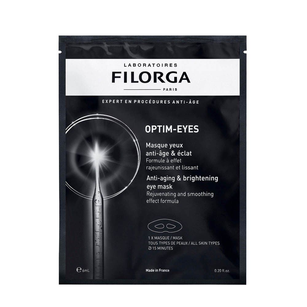 Augenmaske in schwarzer Verpackung. Marke FILORGA. Text: Optim-Eyes, Anti-Aging & Aufhellung. 1 Maske, alle Hauttypen, 15 Minuten.