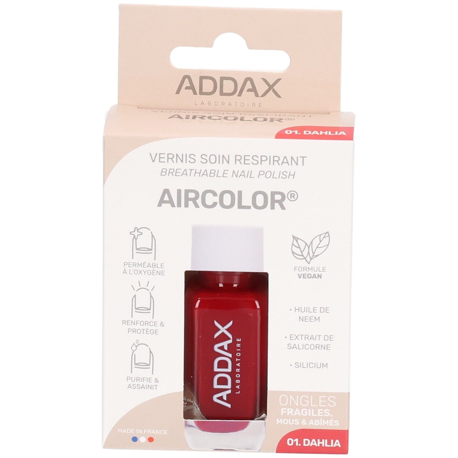 Nagellack-Fläschchen in Verpackung. Rote Farbe, Marke ADDAX. Verpackung mit Produktinformationen.
