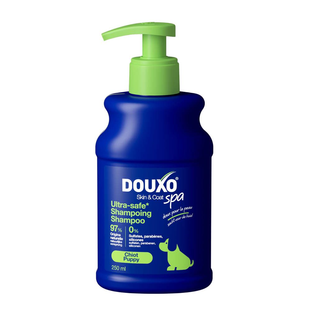 Douxo Spa Welpen-Shampoo in blauer Flasche mit Pumpspender und Welpen-Logo.