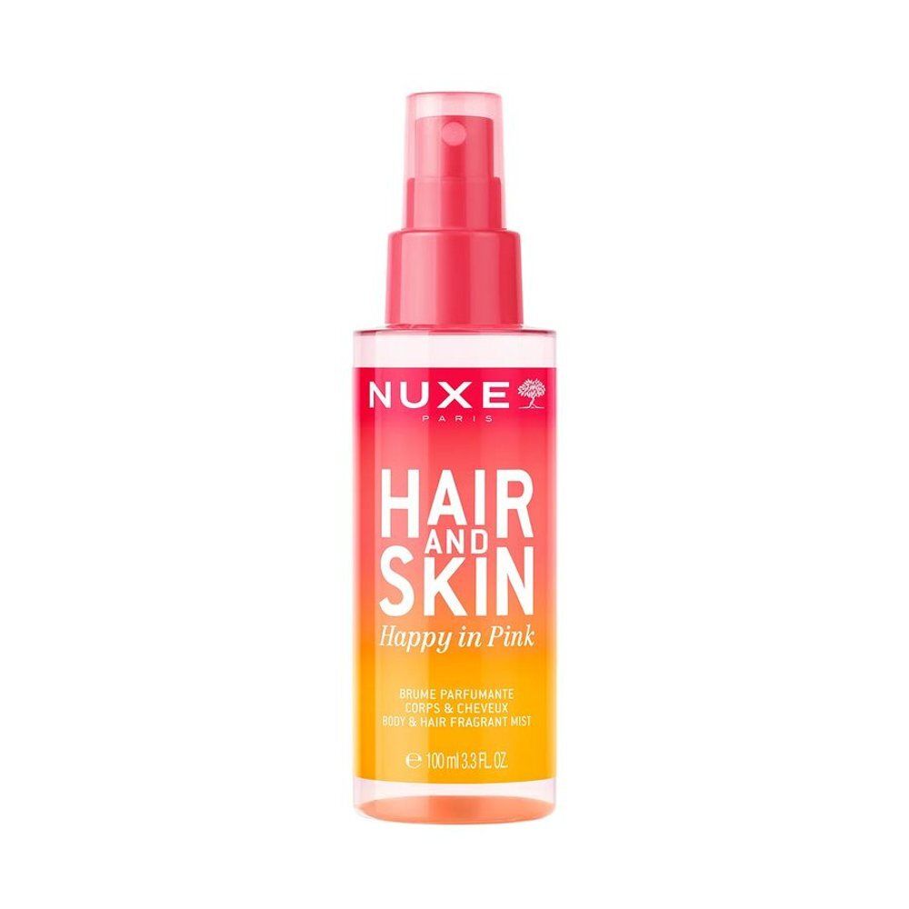 Flacon rose-orangé Nuxe Hair and Skin Brume, avec vaporisateur. Inscription: Hair and Skin, Happy in Pink.