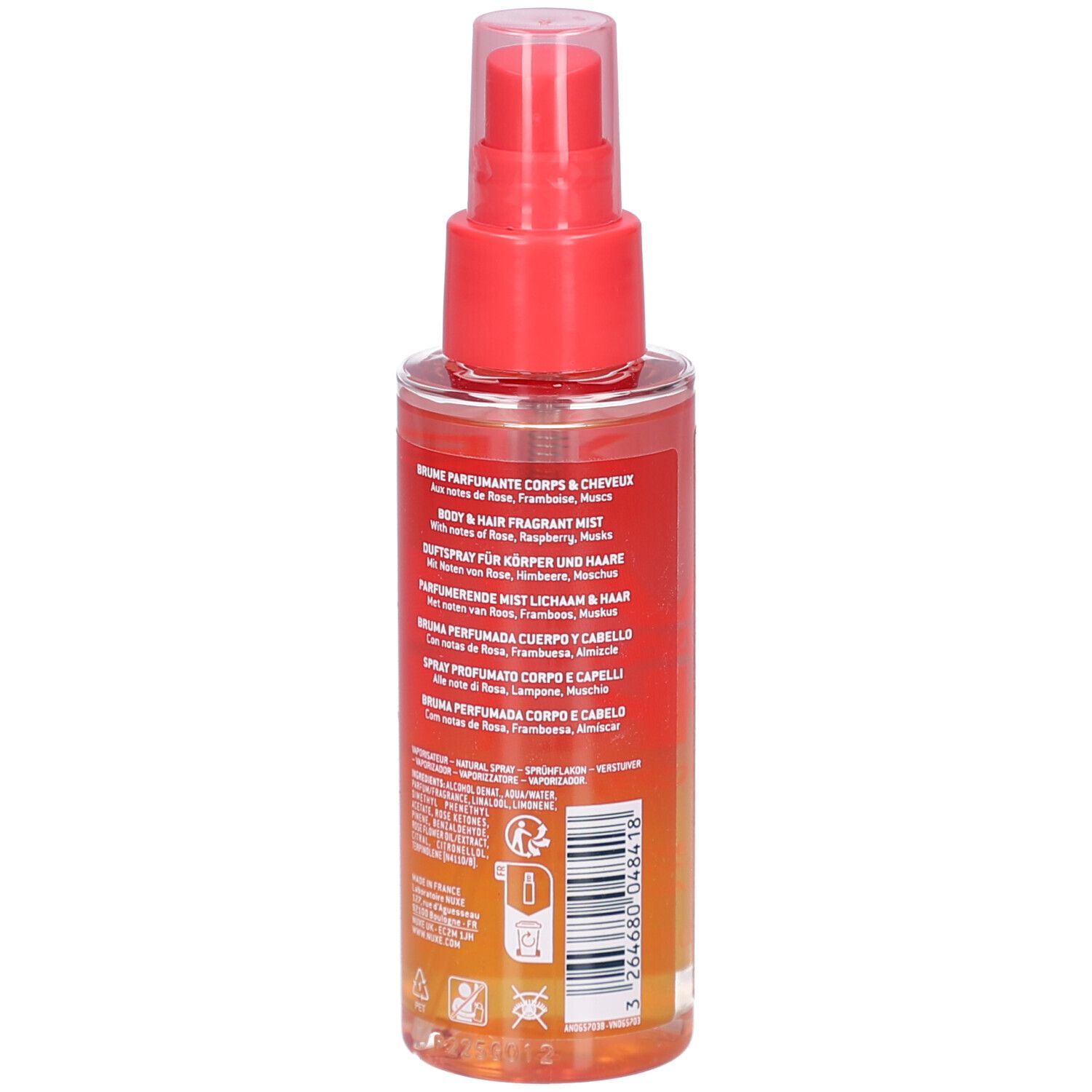 Rückansicht der rosa-orangefarbenen Flasche Nuxe Hair and Skin Brume. Mehrsprachiger Text auf dem Etikett.