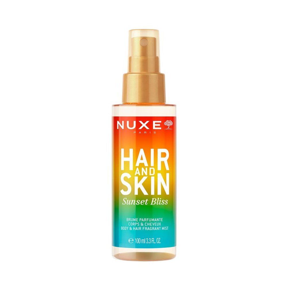 Brume parfumée corps et cheveux. Dégradé de couleurs orange à vert. Inscription: Nuxe, Hair and Skin, Sunset Bliss. Vaporisateur.