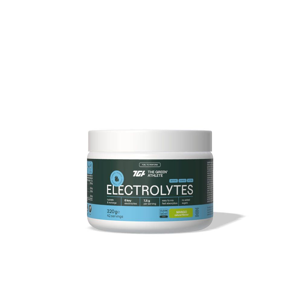 Pot rond blanc avec étiquette verte. Inscription : Electrolytes, 6 électrolytes, 320g, mangue. Marque : The Green Athlete.