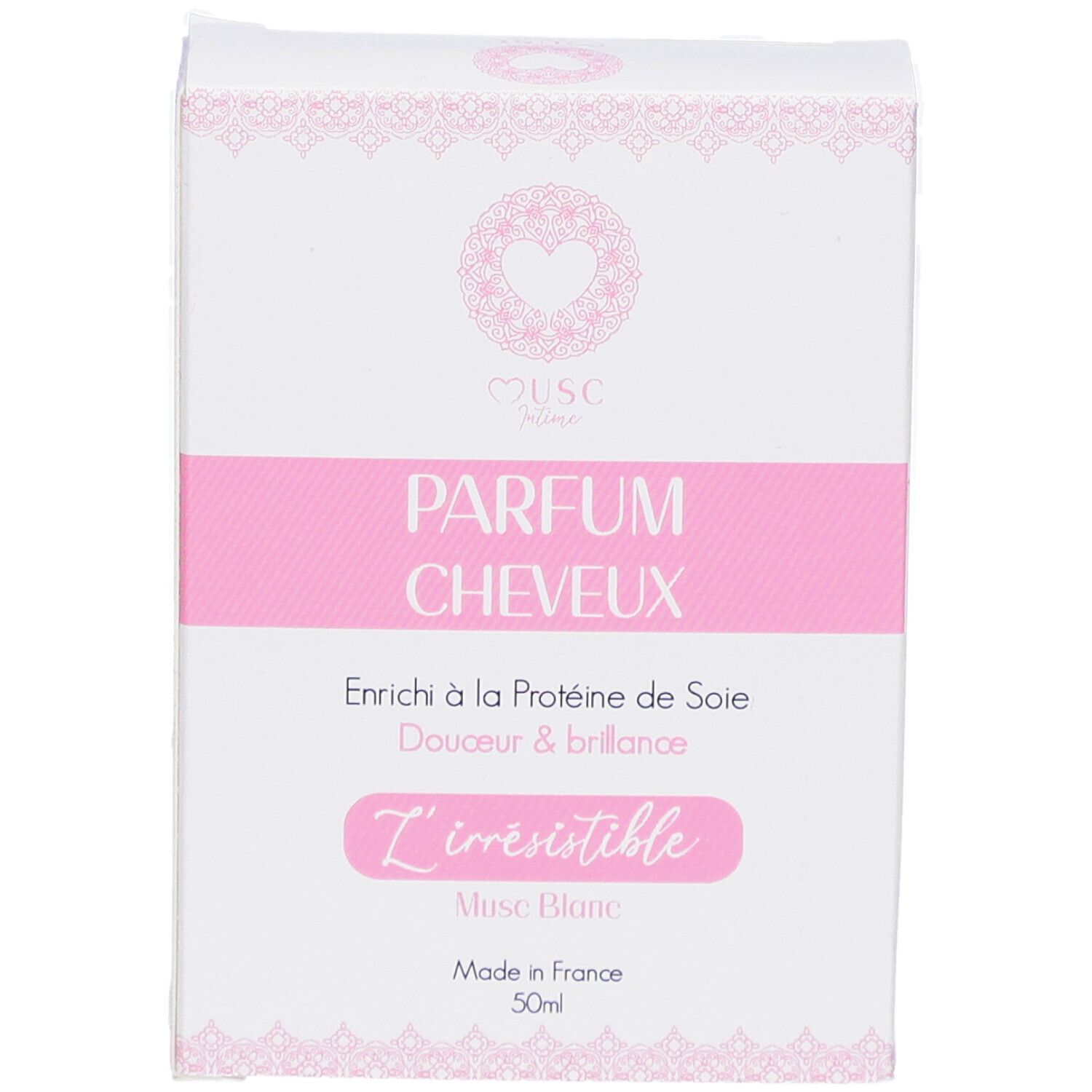 Weißer Karton mit rosa Akzenten. Text: PARFUM CHEVEUX, L'irrésistible, Musc Blanc, Made in France, 50ml.