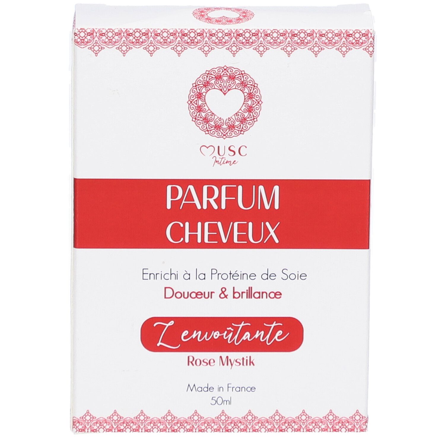 Weißer Karton mit rotem Streifen. Aufschrift: PARFUM CHEVEUX. Enthält Seidenproteine. Rose Mystik. Made in France. 50ml.