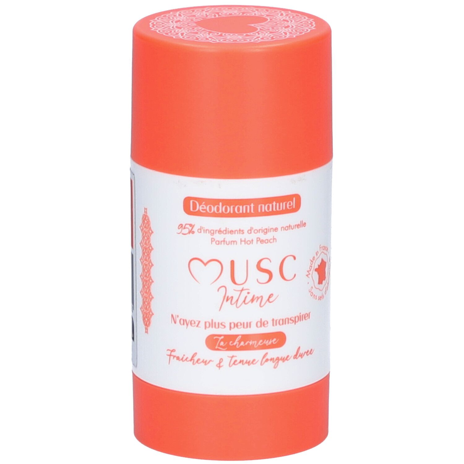 Deodorant-Stick. Orangefarbener Behälter mit weißem Etikett. Text: Musc Intime, Hot Peach. Französische Beschriftung.