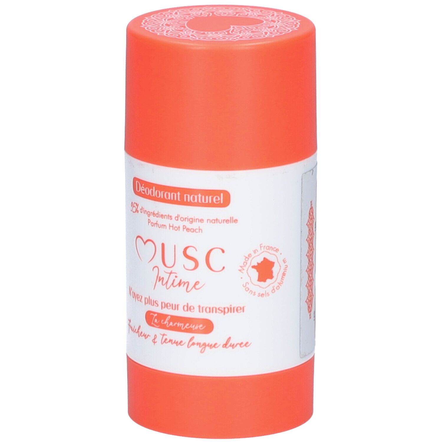 Deodorant-Stick. Orangefarbener Behälter mit weißem Etikett. Text: Musc Intime, Hot Peach. Französische Beschriftung.